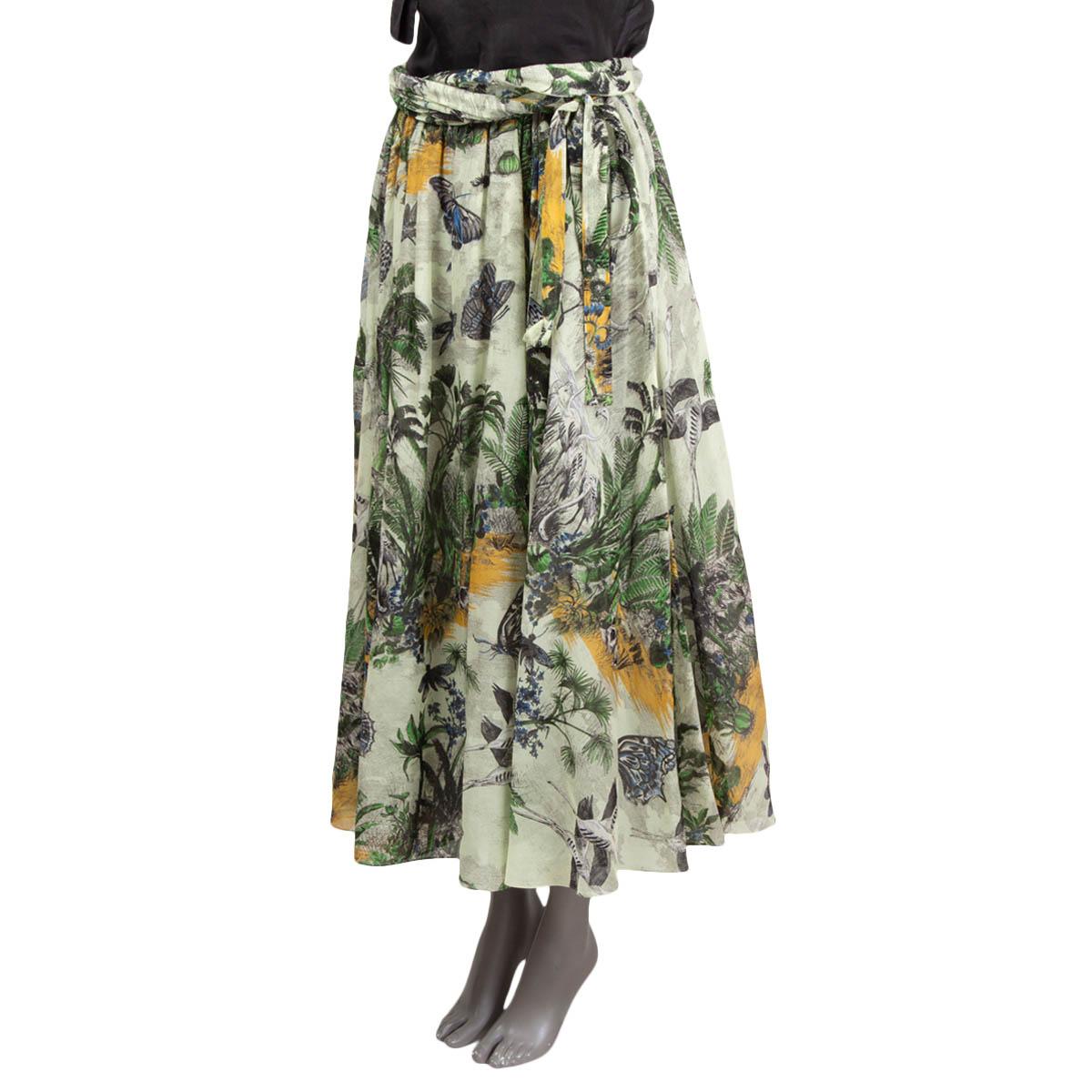 100% authentic Christian Dior 2019 Toile de Jouy Tropicalia flared midi skirt in pale mint green, green, black, blue, light grey and mustard. Opens with a zipper on the side and is lined in white soft tulle polyamide (100%). The design features a