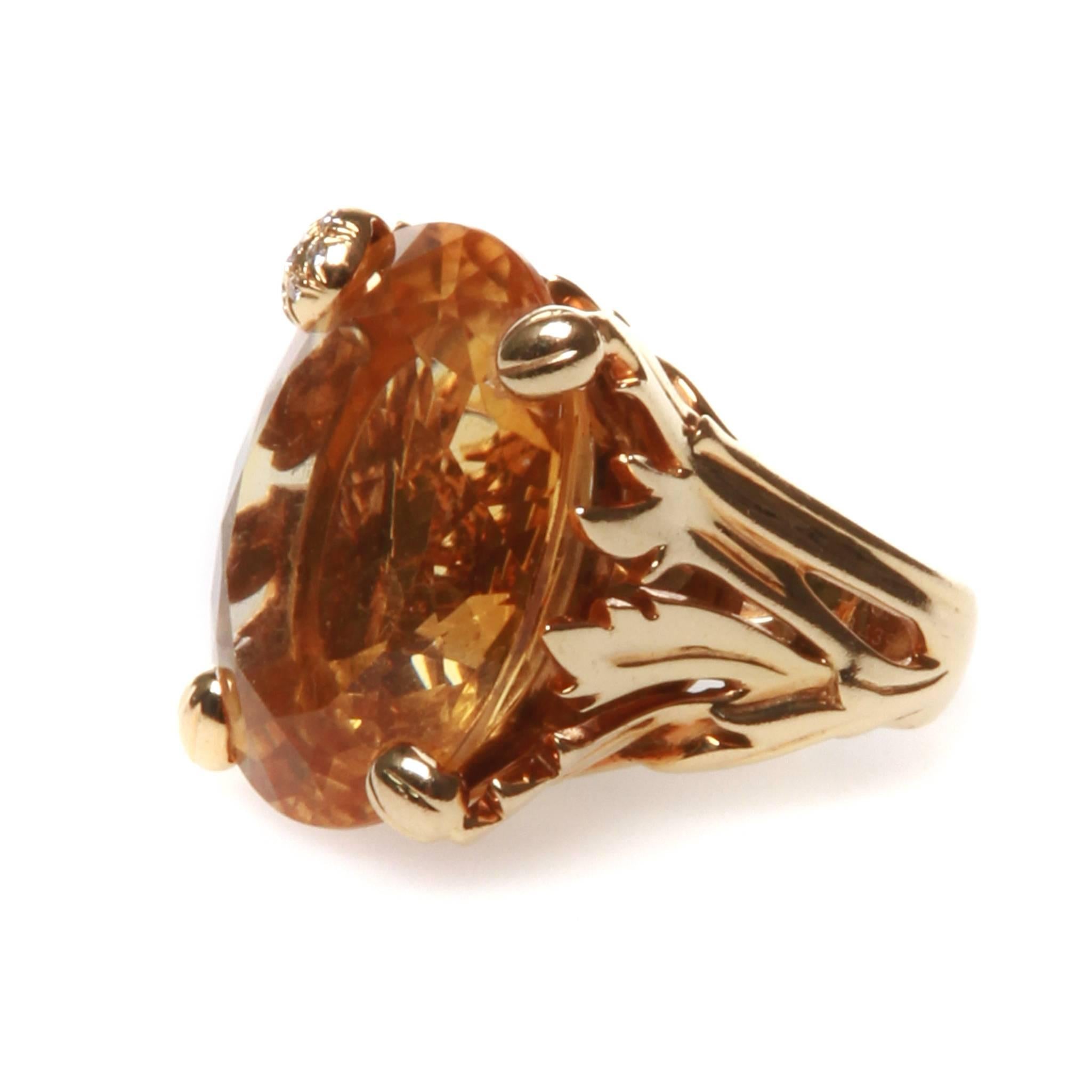 'Miss Dior' large 18k yellow gold ring with 26.5mm x 23mm x 10mm oval citrine gemstone and diamonds. Ring size 6 1/2, ring top is 27mm x 21mm. 

Engraved: Dior 750 A 843 97 52