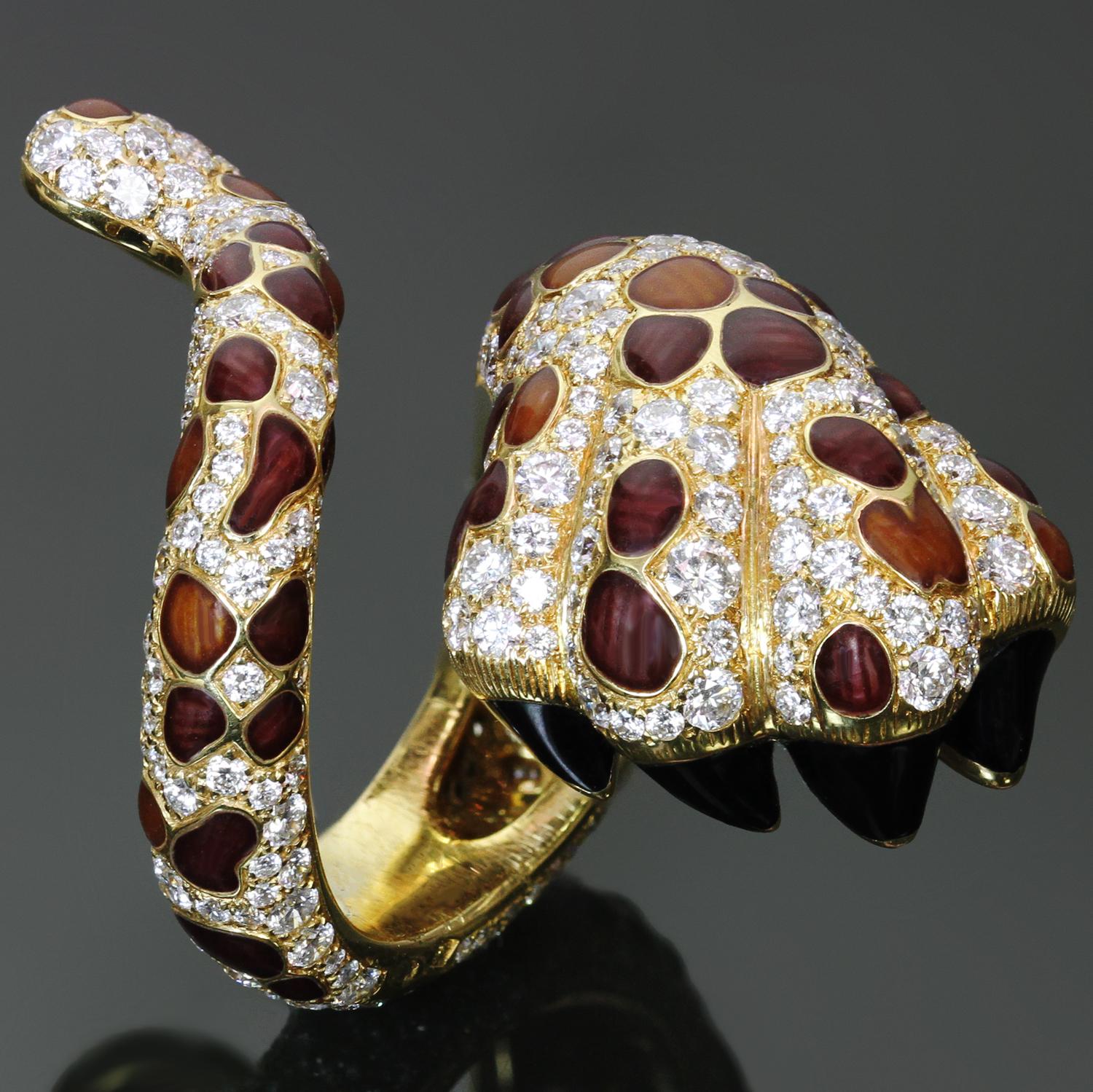 This magnificent authentic Christian Dior Mitzah collection ring features a chic leopard paw and tail design crafted in 18k yellow gold and accented with lacquer spots and black enamel claws and pave-set with brilliant-cut round diamonds. Made in