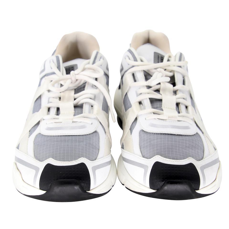 Christian Dior Monogram 43 Trainers Sneakers CD-0707N-0014

Christian Dior signature 2020 trainers with signature web-style perfect for daily use simply upgrade your wardrobe. Multi-panelled design, cord-style laces, Dior logo on the tongue and