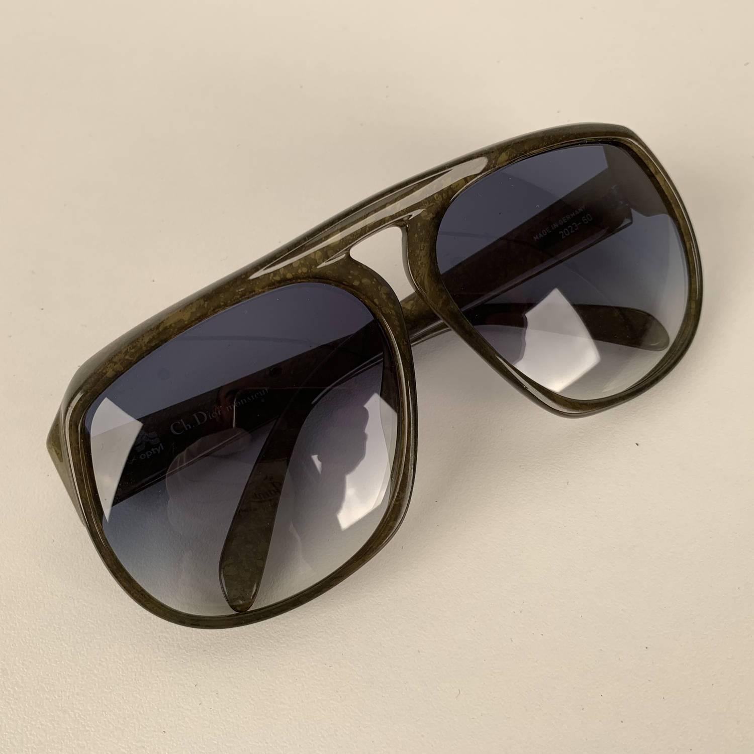 MATERIAL: Optyl COLOR: Green MODEL: Aviator GENDER: Adult Unisex SIZE: Large COUNTRY OF MANUFACTURE: Germany Condition CONDITION DETAILS: NEW - NOS (NEW OLD STOCK) - It will come with a Generic Case Measurements MEASUREMENTS: TEMPLE MAX. LENGTH: 140
