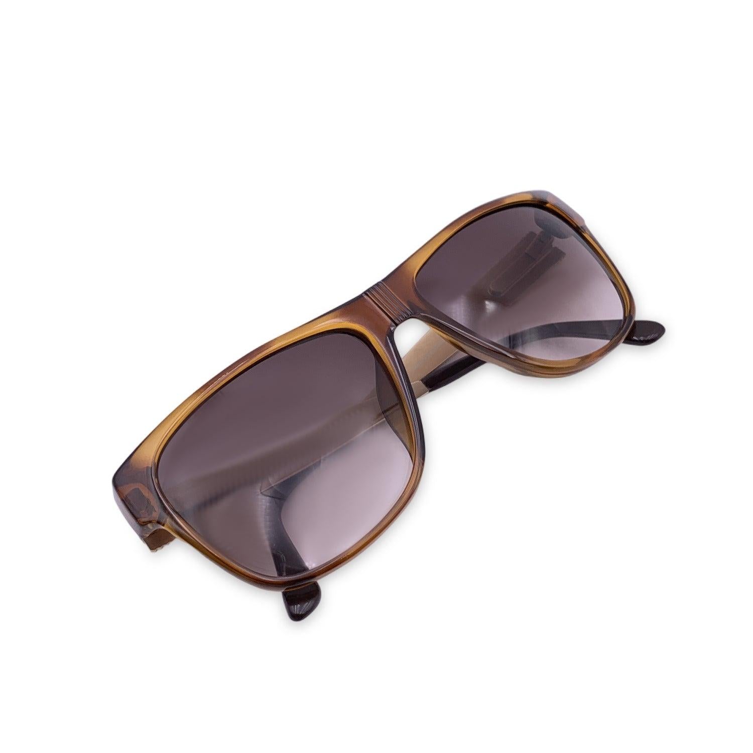 Vintage Christian Dior Monsieur Sunglasses, Mod. 2406 11 Optyl. Size: 57/16 140mm. Brown acetate frame, with gold metal finish on the sides. CD logo con temples . 100% Total UVA/UVB protection. Brown gradient lenses. Condition A+ - MINT Never Worn,