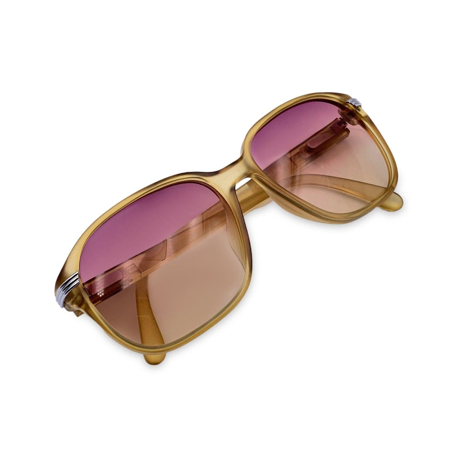 Vintage Christian Dior Monsieur Unisex Sunglasses, Mod. 2432 70 Size 56/16 140mm. Honey yellow semi transparent Optyl frame. 100% Total UVA/UVB protection purple bi-color gradient lenses. CD logos on the side of the temples. Details MATERIAL: