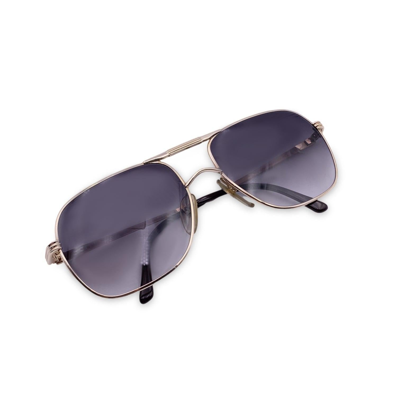 Vintage Christian Dior Monsieur Unisex Sunglasses from the 1980s. Mod. 2443 40. Size: 57/18 130mm. Gold metal frame with dark brown finish. 100% Total UVA/UVB protection grey gradient lenses. CD logos on the sides of the temples. Details MATERIAL:
