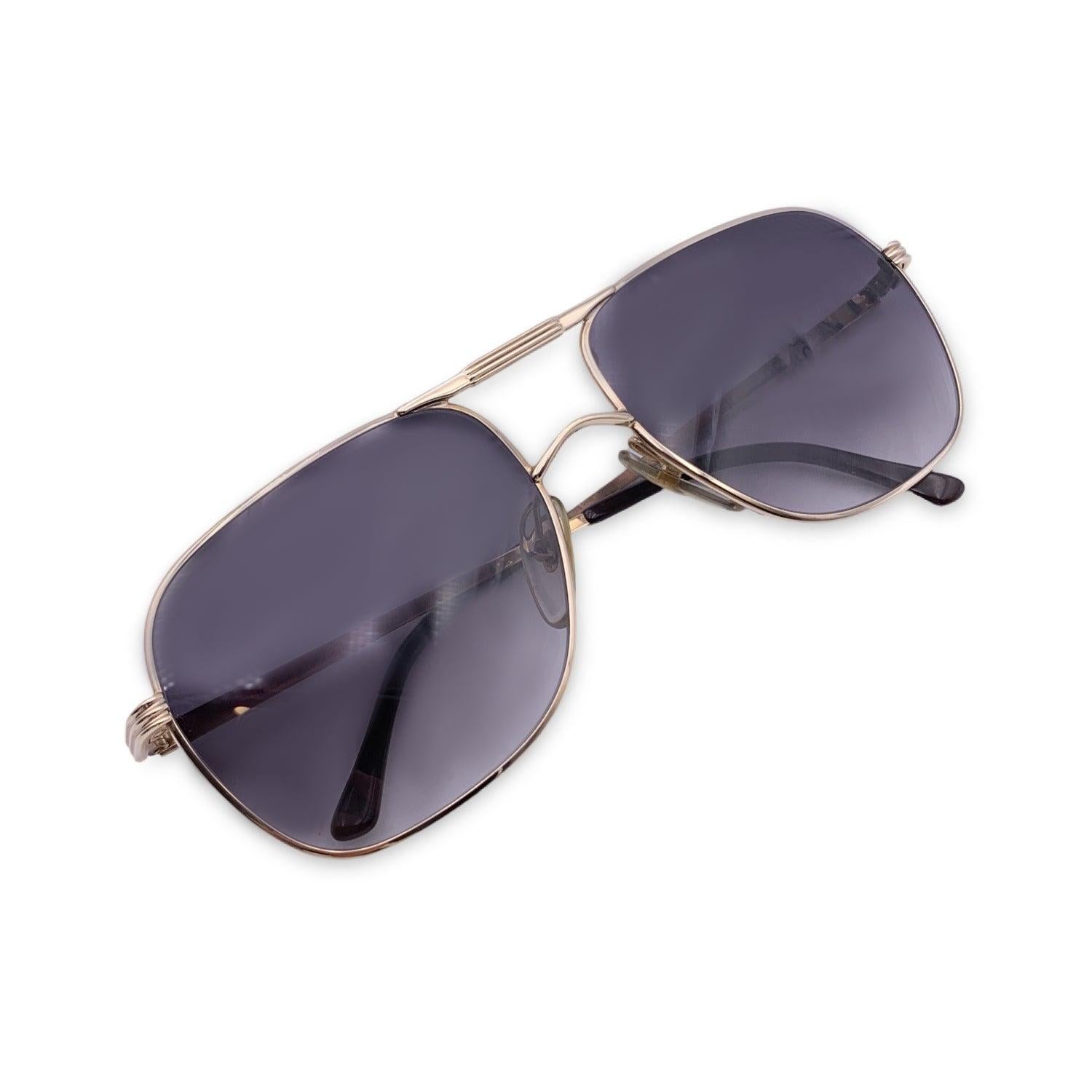 Vintage Christian Dior Monsieur Unisex Sunglasses from the 1980s. Mod. 2443 40. Size: 59/18 135mm. Gold metal frame with dark brown finish. 100% Total UVA/UVB protection grey gradient lenses. CD logos on the side of the temples. Details MATERIAL: