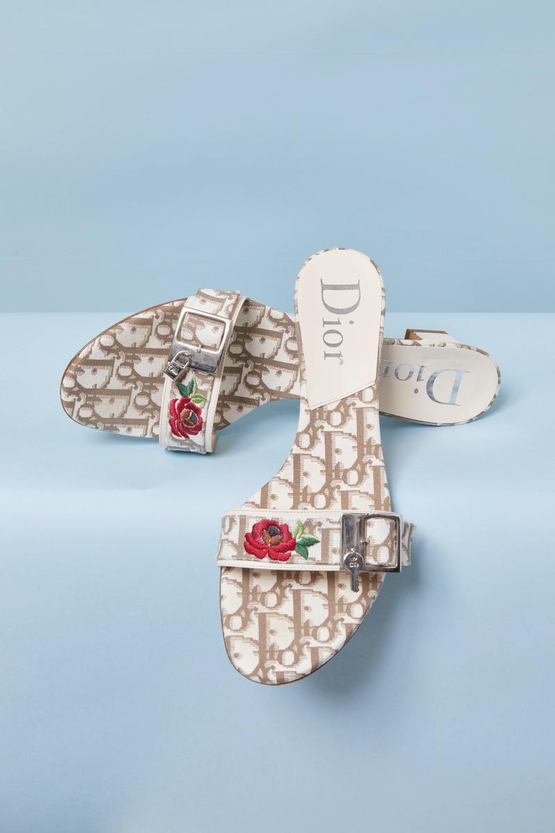 Christian Dior mules in monogram canvas with embroidered rose.