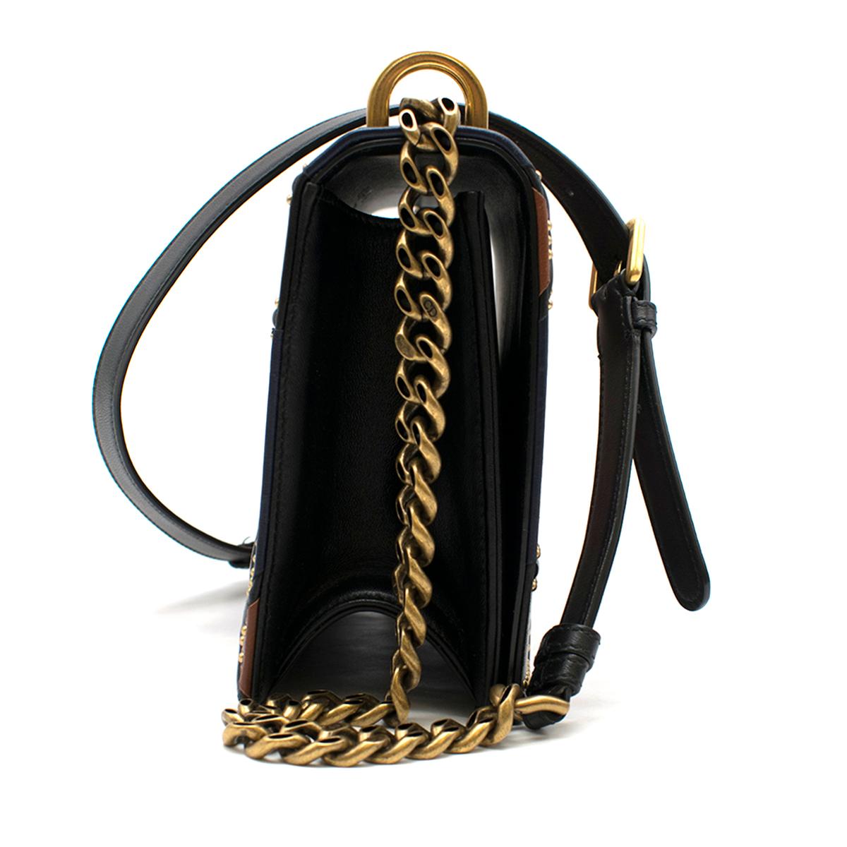 Christian Dior Multi-coloured Patchwork Diorama Bag

- Multi-coloured patchwork diorama bag
- Lambskin, soft leather
- Studded 
- Large 'Cannage' motif 
- Jewellery in aged gold-tone metal
- Adjustable strap
- Carried on the shoulder or across the
