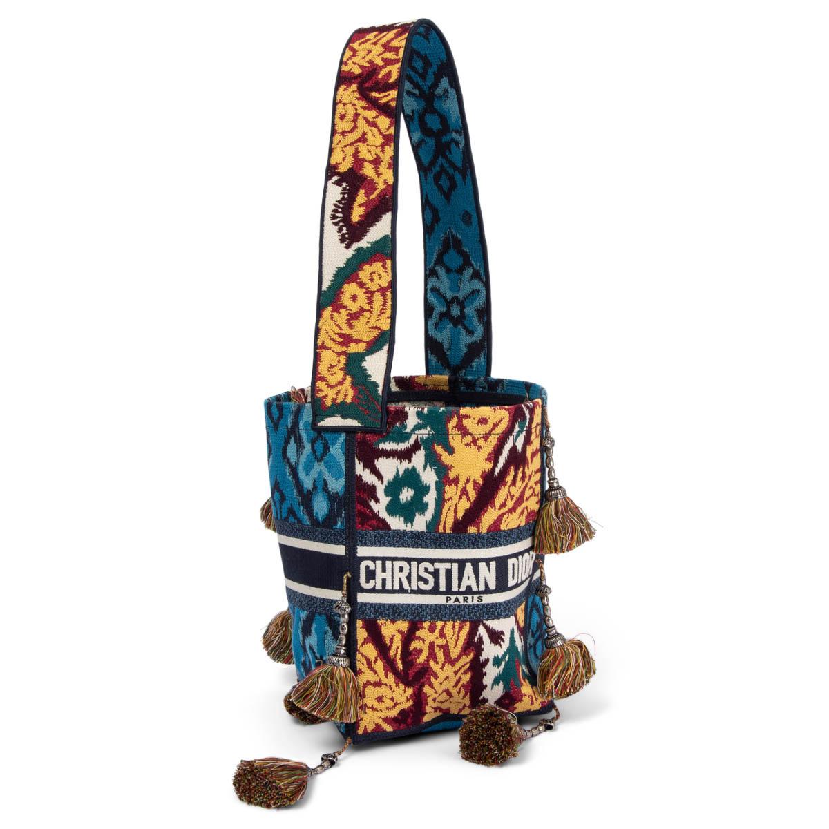 100% authentic Christian Dior 2021 D-Bucket shoulder bag in multicolor Paisley Embroidery embellished with tassels and silver-tone traditional Endek Bali Indonesia. Unlined. Brand new. Comes with dust bag. 

Measurements
Height	24cm