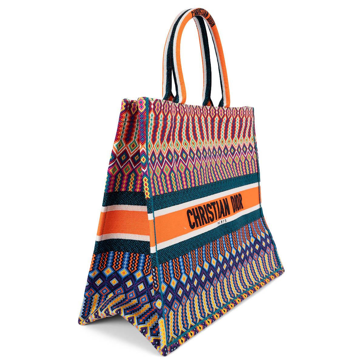 100% authentic Christian Dior Book Tote Large in orange, green, purple, yellow and petrol and pink mexican embroidered canvas. Brand new. Comes with dust bag.  

2018 Spring/Summer

Measurements
Height	35cm (13.7in)
Width	42cm (16.4in)
Depth	18cm