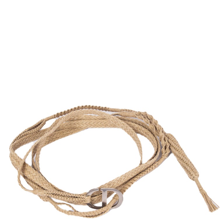 100% authentic Christian Dior double wrap rope belt in natural raffia featuring silver-tone CD metal buckle. Has been worn and is in excellent condition. Comes with dust bag.  

2020 Spring/Summer

Measurements
Length	305cm (119in)
Buckle Size