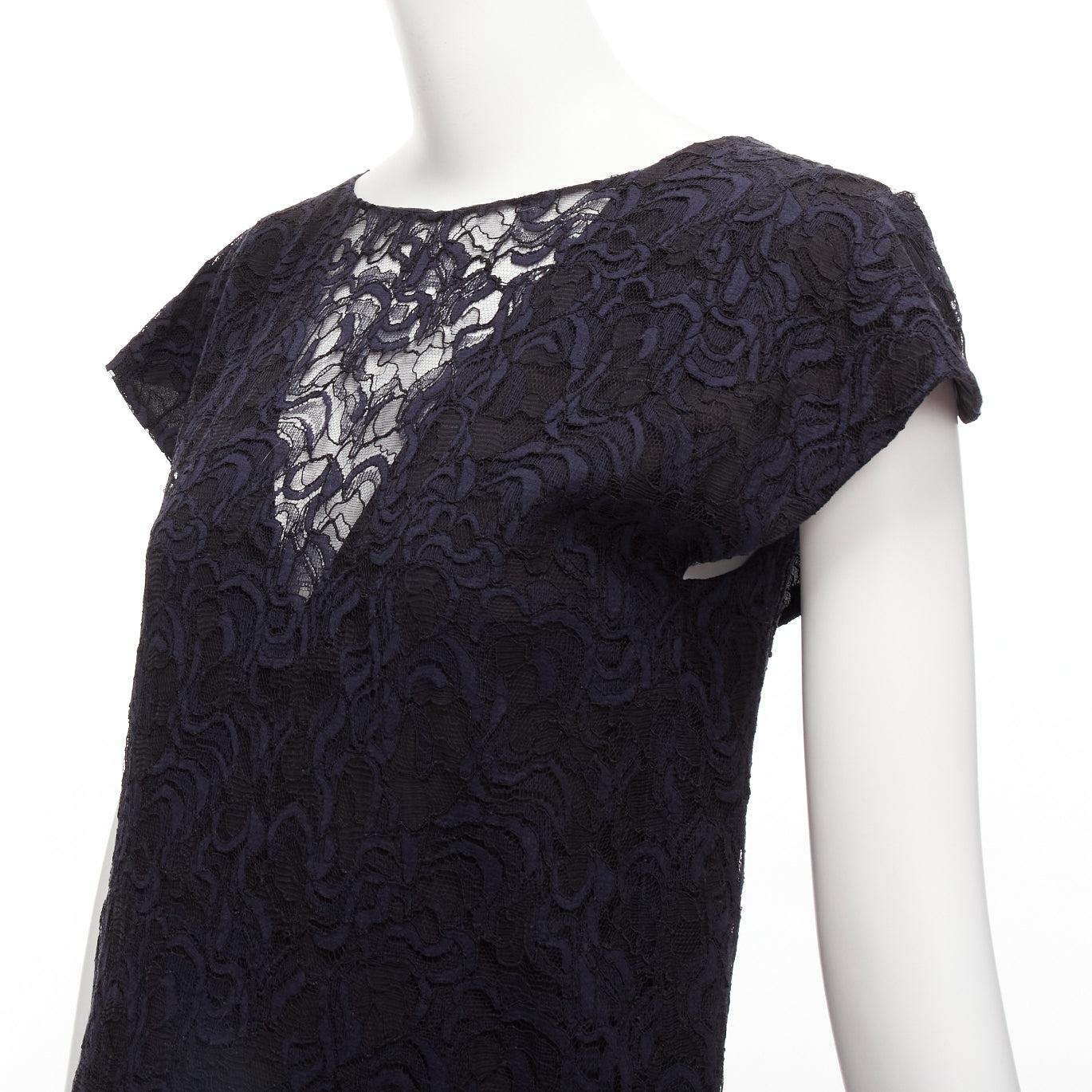 CHRISTIAN DIOR navy black lace overlay V back see through ruffle hem dress
Reference: NILI/A00038
Brand: Dior
Designer: Raf Simons
Material: Lace
Color: Navy, Black
Pattern: Lace
Closure: Zip
Lining: Black Fabric
Made in: