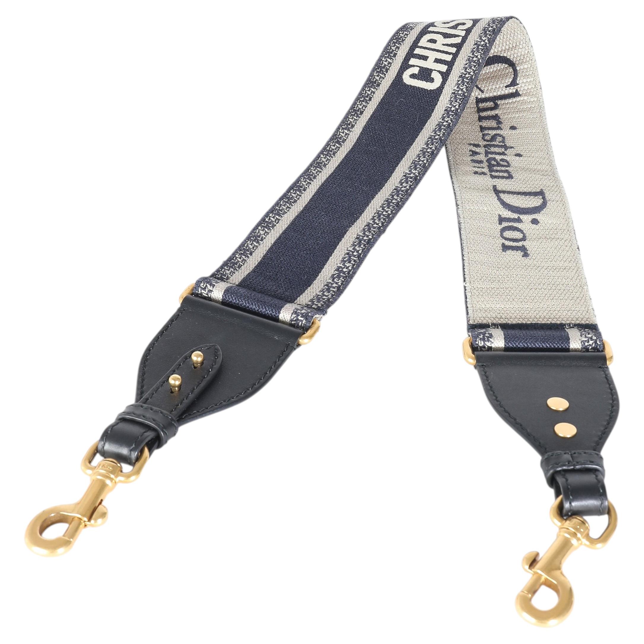 How do you attach a Lady Dior bag strap?