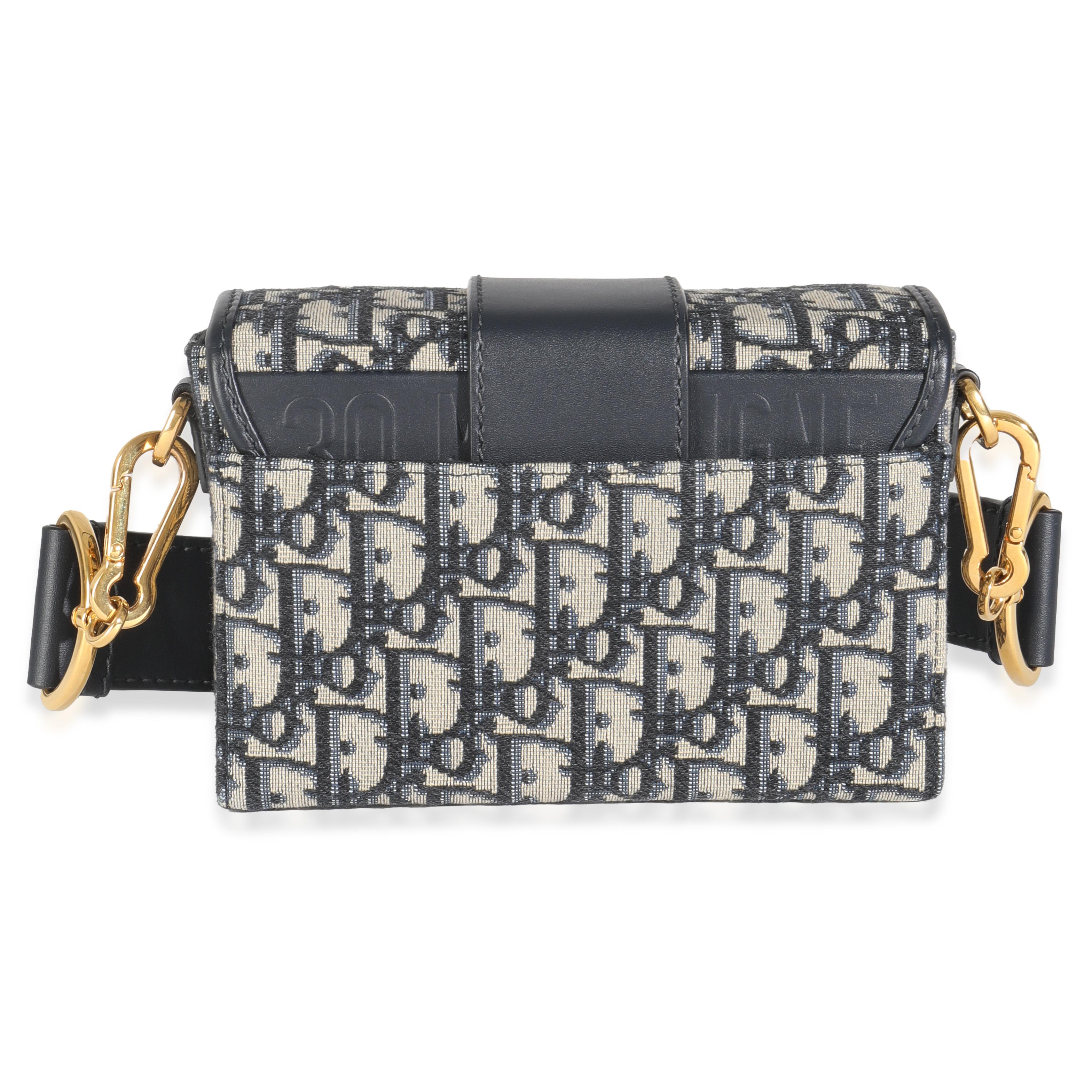 Listing Title: Christian Dior Navy Oblique Canvas 30 Montaigne Box
SKU: 145018
Condition: Pre-owned 
Handbag Condition: Very Good
Condition Comments: Item is in very good condition with minor signs of wear.   Scratches along exterior leather and