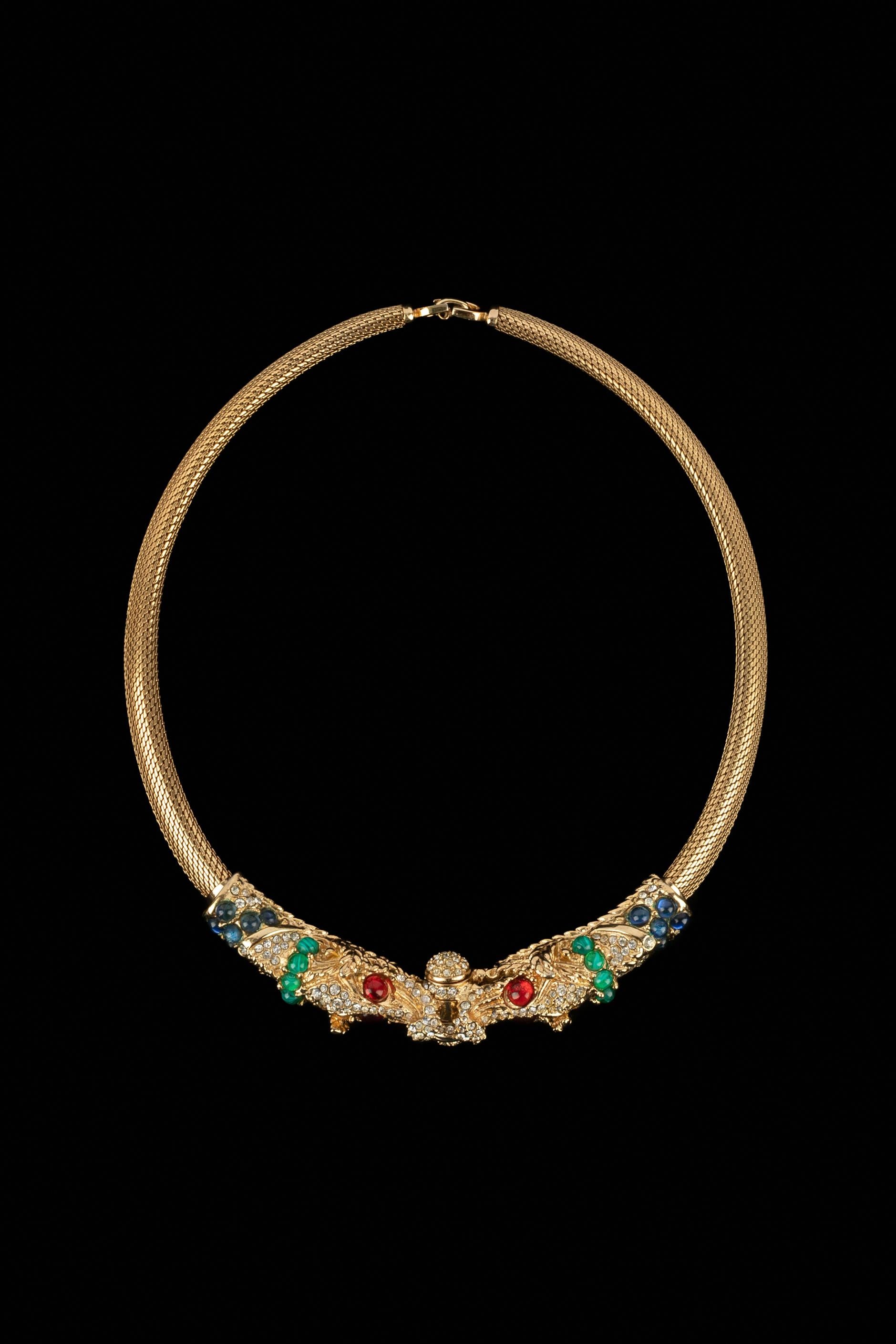 glass paste cabochons. 1990 Fall-Winter Haute Couture Collection, under the artistic direction of Gianfranco Ferré.

Condition:
Very good condition

Dimensions:
Length: 37 cm

SKU:BC277


