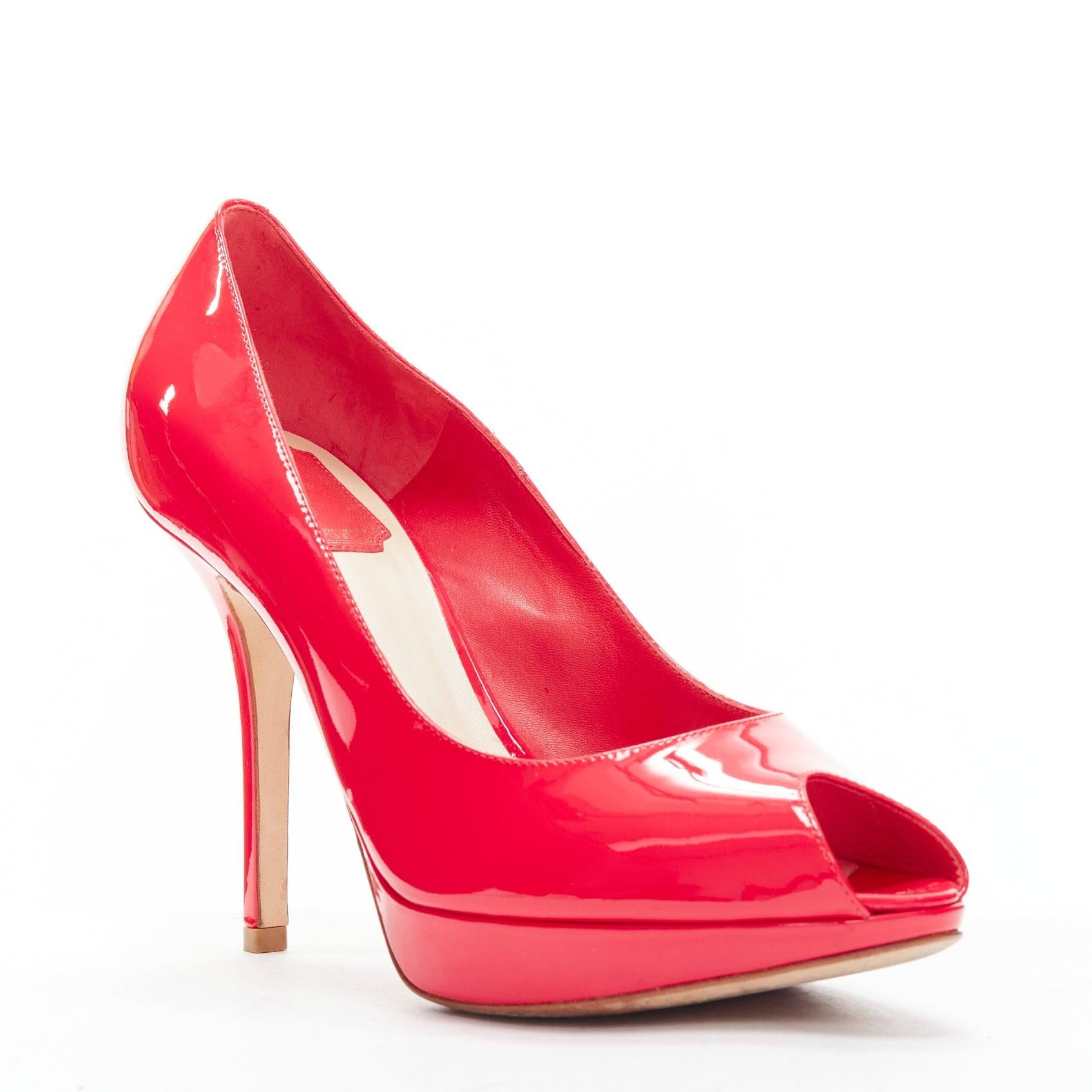 CHRISTIAN DIOR neon pink patent leather peep toe platform pumps EU38
Reference: MEKK/A00008
Brand: Dior
Material: Leather
Color: Neon Pink
Pattern: Solid
Closure: Slip On
Lining: Nude Leather
Extra Details: Logo plate at back.
Made in: