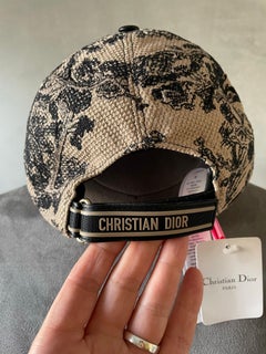 CHRISTIAN DIOR New toile de jouy cap with label never worn.