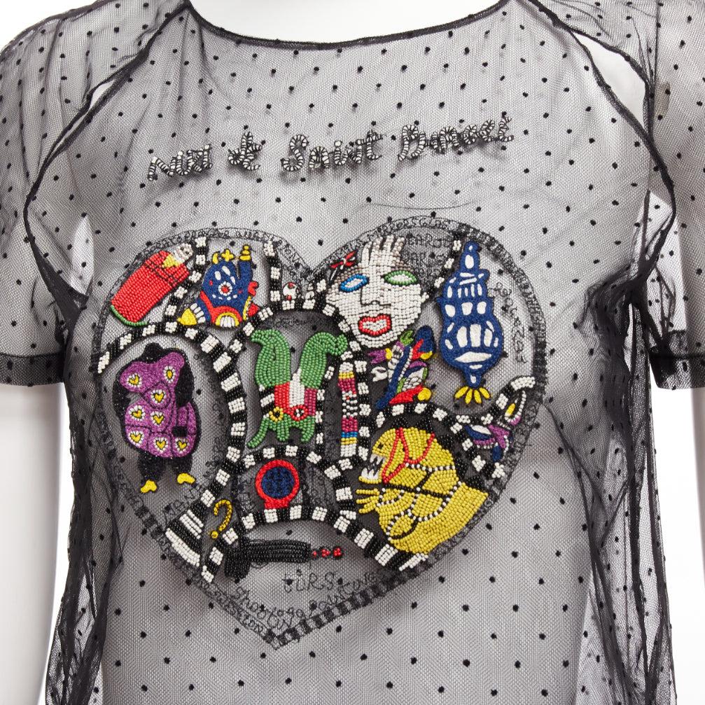 CHRISTIAN DIOR Niki de Saint Phalle black colourful beaded dot mesh sheer top
Reference: AAWC/A01125
Brand: Dior
Collection: Niki de Saint Phalle 2018 SS - Runway
Material: Mesh
Color: Black, Multicolour
Pattern: Dotted
Closure: Keyhole Button
Extra