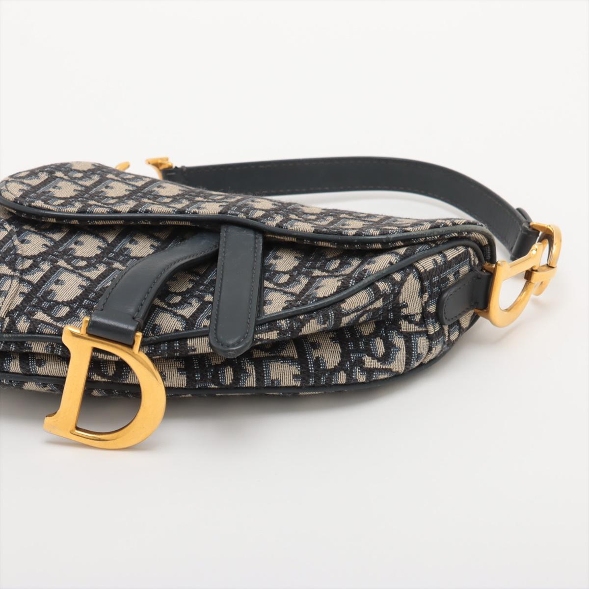 Christian Dior Bolso oblicuo de lona y piel azul marino en Bueno estado para la venta en Humacao, PR