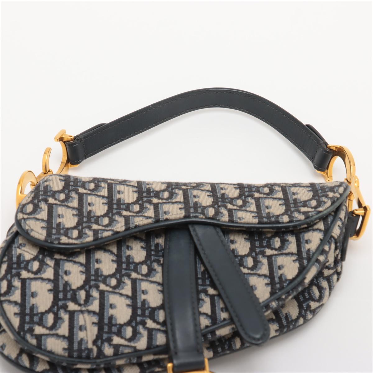 Christian Dior Bolso oblicuo de lona y piel azul marino en venta 2