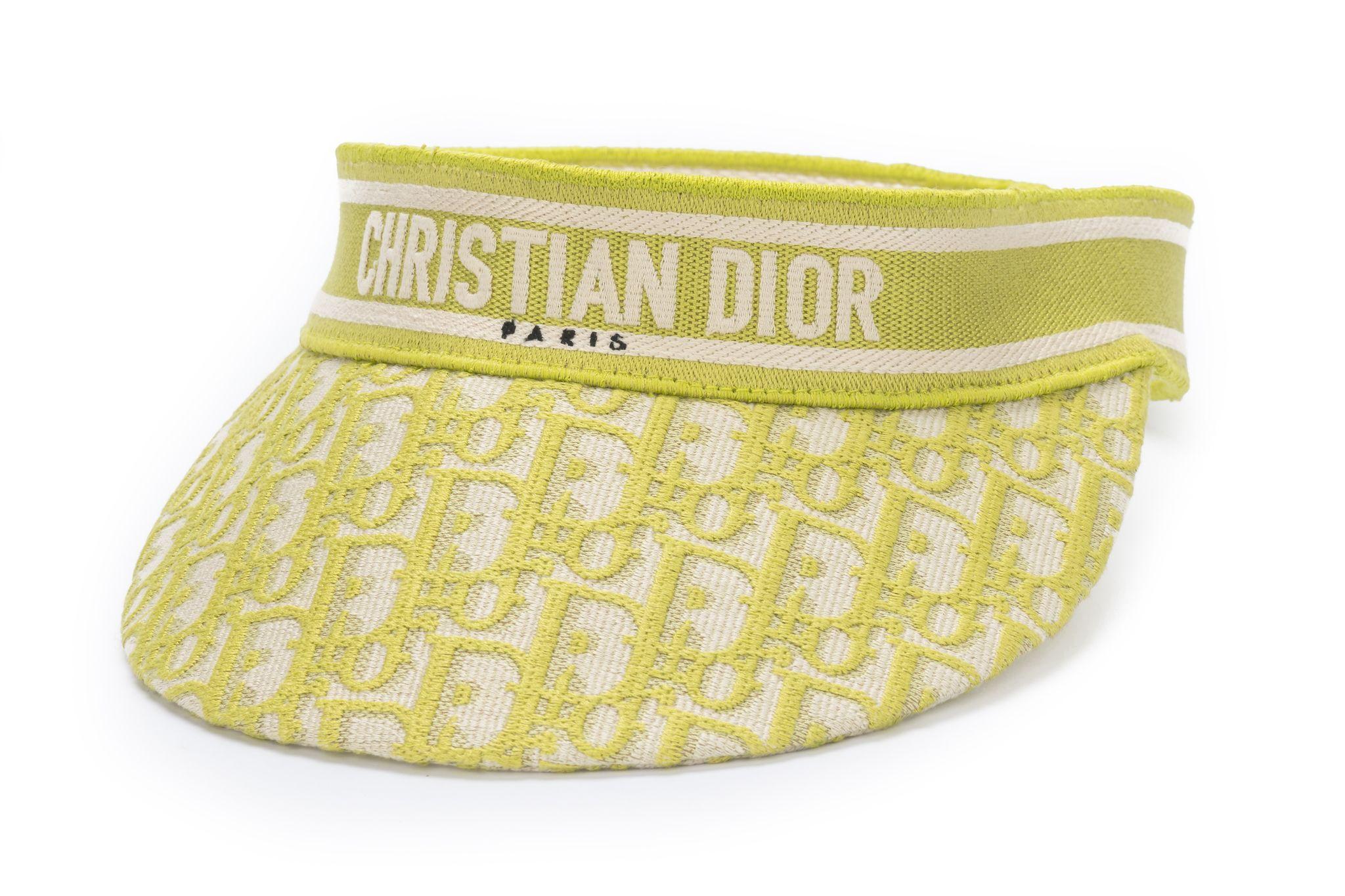 Lime Christian Dior Oblique motif visor. Featuring a tonal embroidered band with 'CHRISTIAN DIOR PARIS' signature. It's new and comes with original dustcover.
