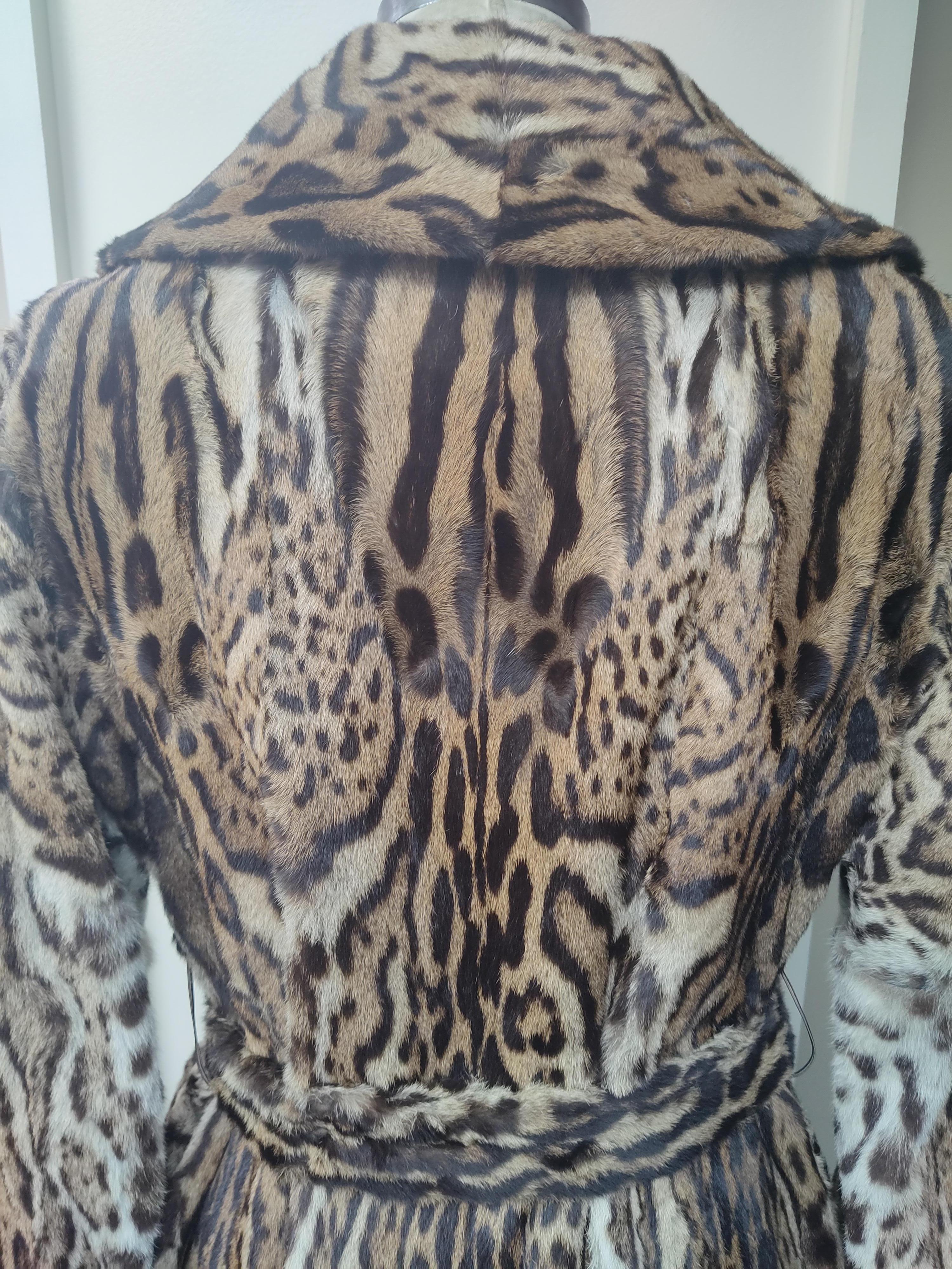 PRODUCT DESCRIPTION:

Brand new luxurious Christian Dior Ocelot fur coat 

Condition: Brand New

Closure: Buttons decoration 
Belt: buckled belt with 