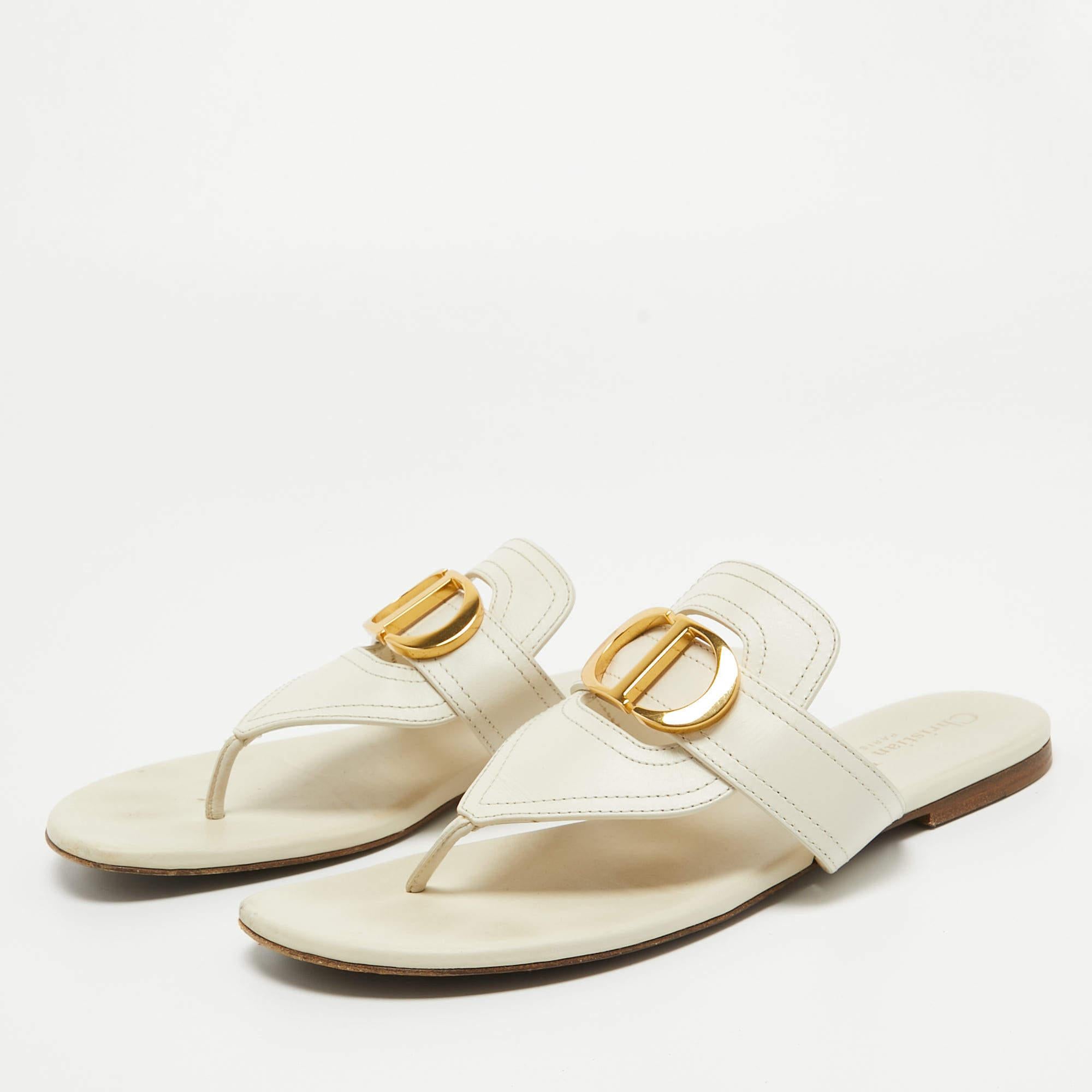 Dior packs the 30 Montaigne flat slide with classic elements and comfort, calling it an 'essential Dior wardrobe piece'. These leather flats feature open toes, the 'CD' logo on the uppers in gold-tone metal, and durable leather soles.

