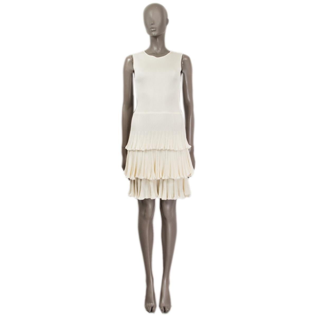 100% authentic Christian Dior ruffle-panelled knit dress in cream viscose (100%). Opens with a concealed zipper on the side and with two buttons on the back. Lined in viscose (90%) and spandex (10%). Has been worn and is in excellent condition.