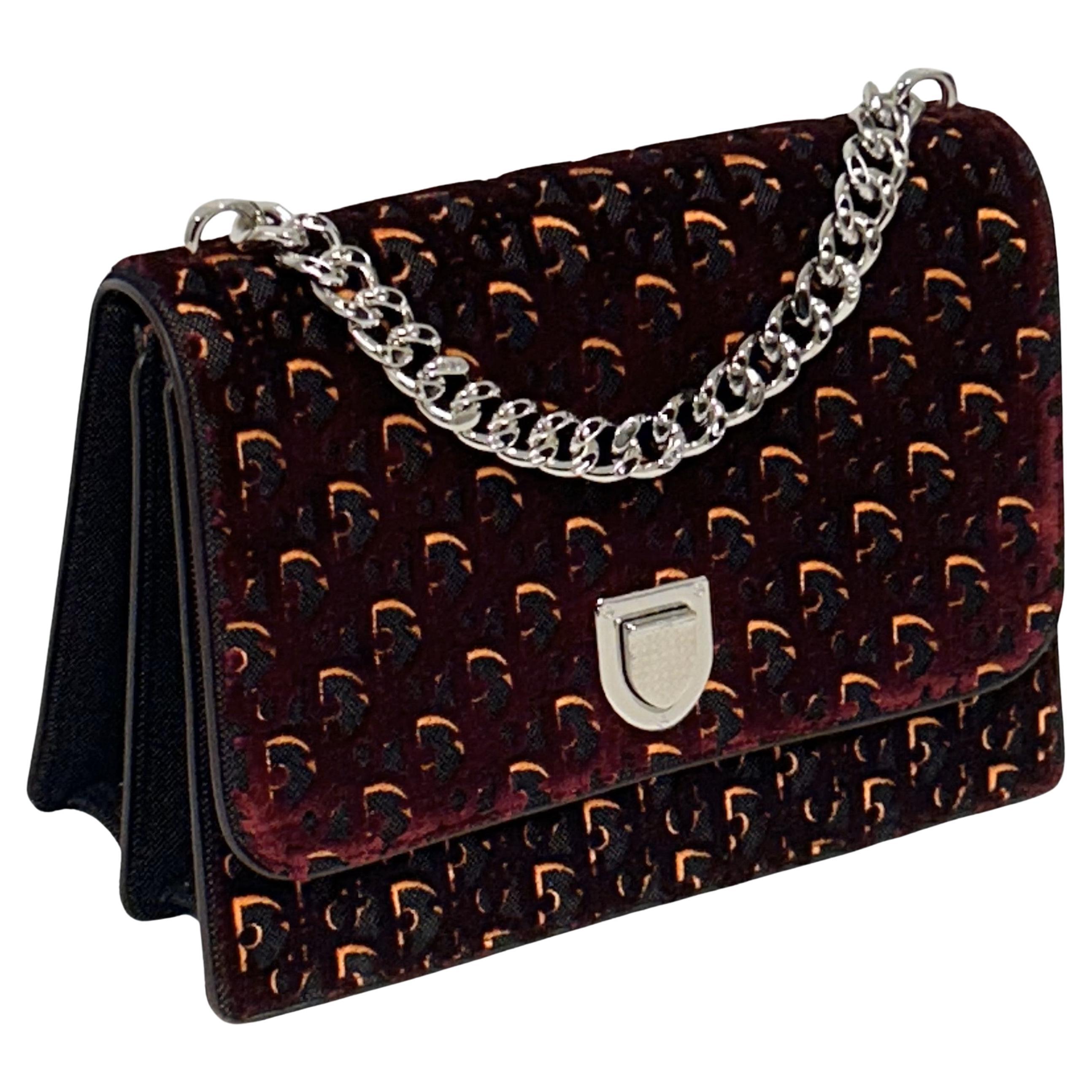 New Bag
Monogram Dior in neon orange , burgundy and black 
Silver top handle chain
Optional cross body strap 
Flap bag with 3 internal compartments ( one zipppered)
Approximate release 2019 
11 wide by 8 high 
cross body strap 19 inches 
