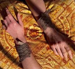 Christian Dior Pair of Bracelets with Four Crossed Golden Leather Bands