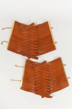 Christian Dior Pairs of Arm/Leg Bracelets in Crossed Golden Leather Bands