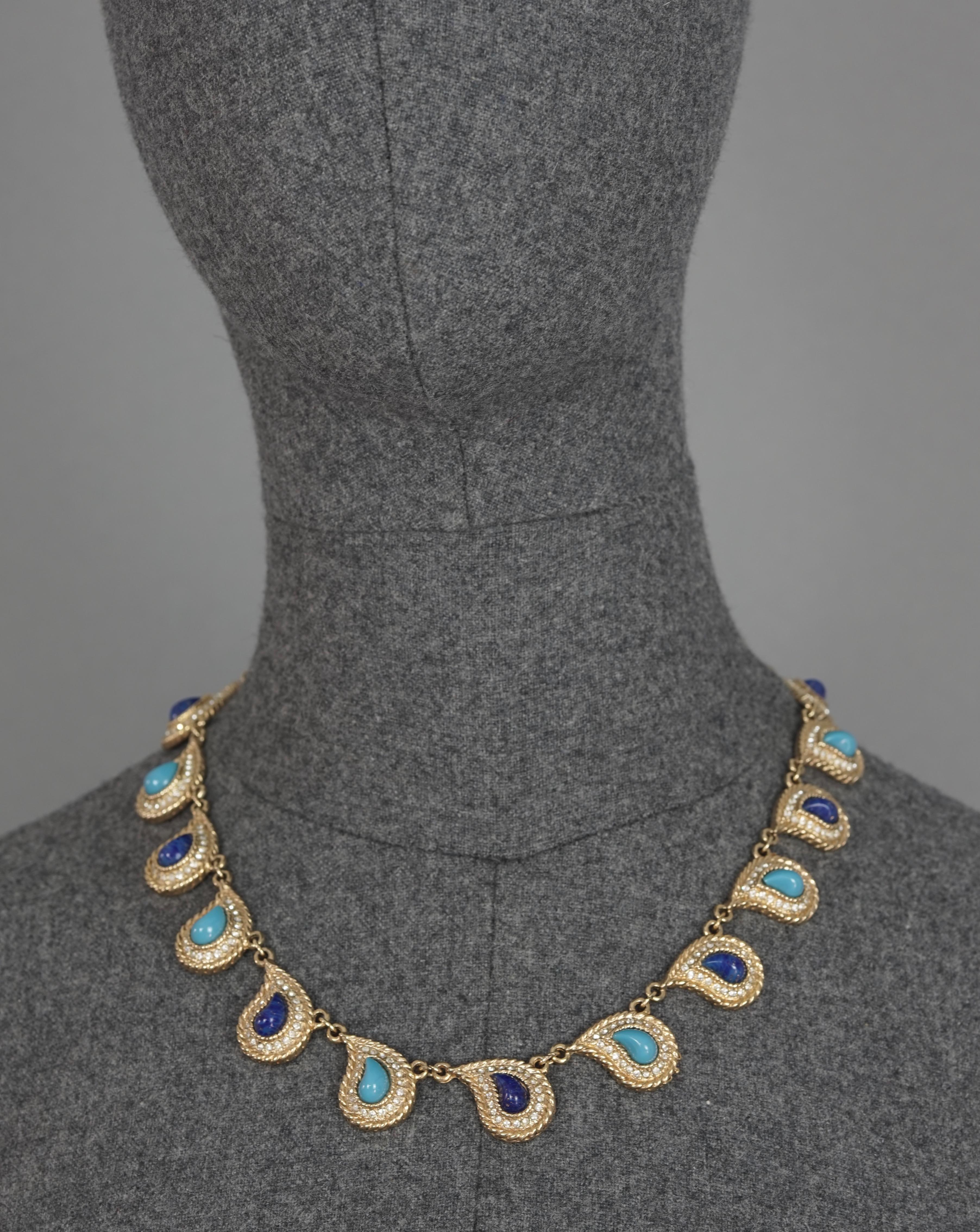 Vintage CHRISTIAN DIOR Paisley Turquoise Lapis Lazuli Cabochon Rhinestone Necklace

Measurements:
Height: 0.78 inch (2 cm)
Width: 15.75 inches to 17.71 inches (40 cm to 45 cm)

Features:
- 100% Authentic CHRISTIAN DIOR.
- Paisley links of turquoise
