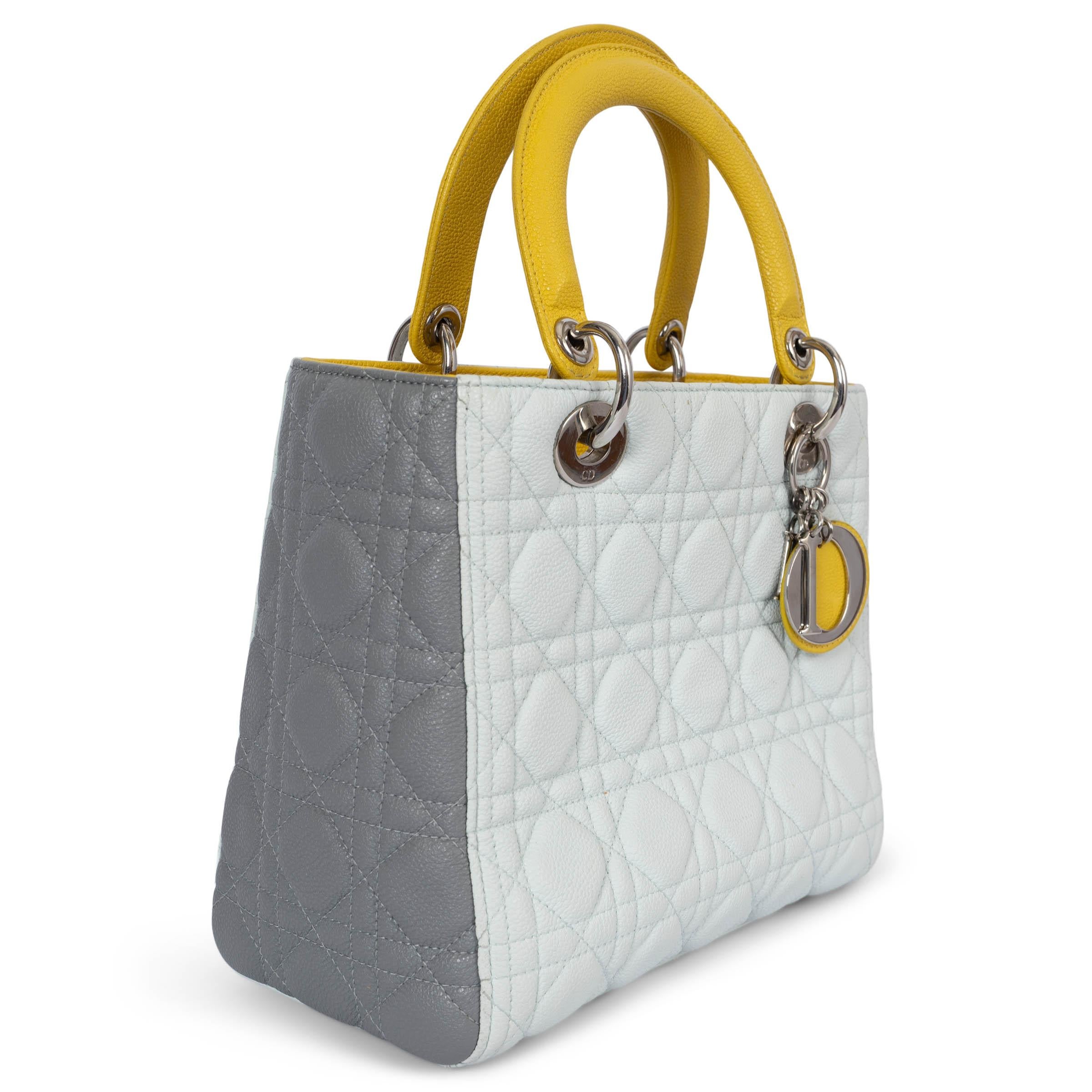 100% authentic Christian Dior 2015 lady Dior in tricolor light blue, yellow and grey Cannage stitching grained leather. Silver-finish metal hardware and the 'D.I.O.R.' charms complete and illuminate its silhouette. Featuring a thin, removable
