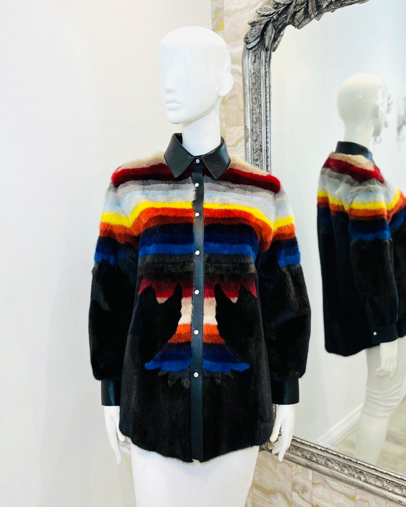 Rare Item - Christian Dior Palm Tree Mink Fur Shirt/Jacket

Black sheared mink fur with a Palm tree design the the front and multicoloured stripe pattern that wraps around the top and sleeves

Detailed with lambskin leather collar, cuffs and centre