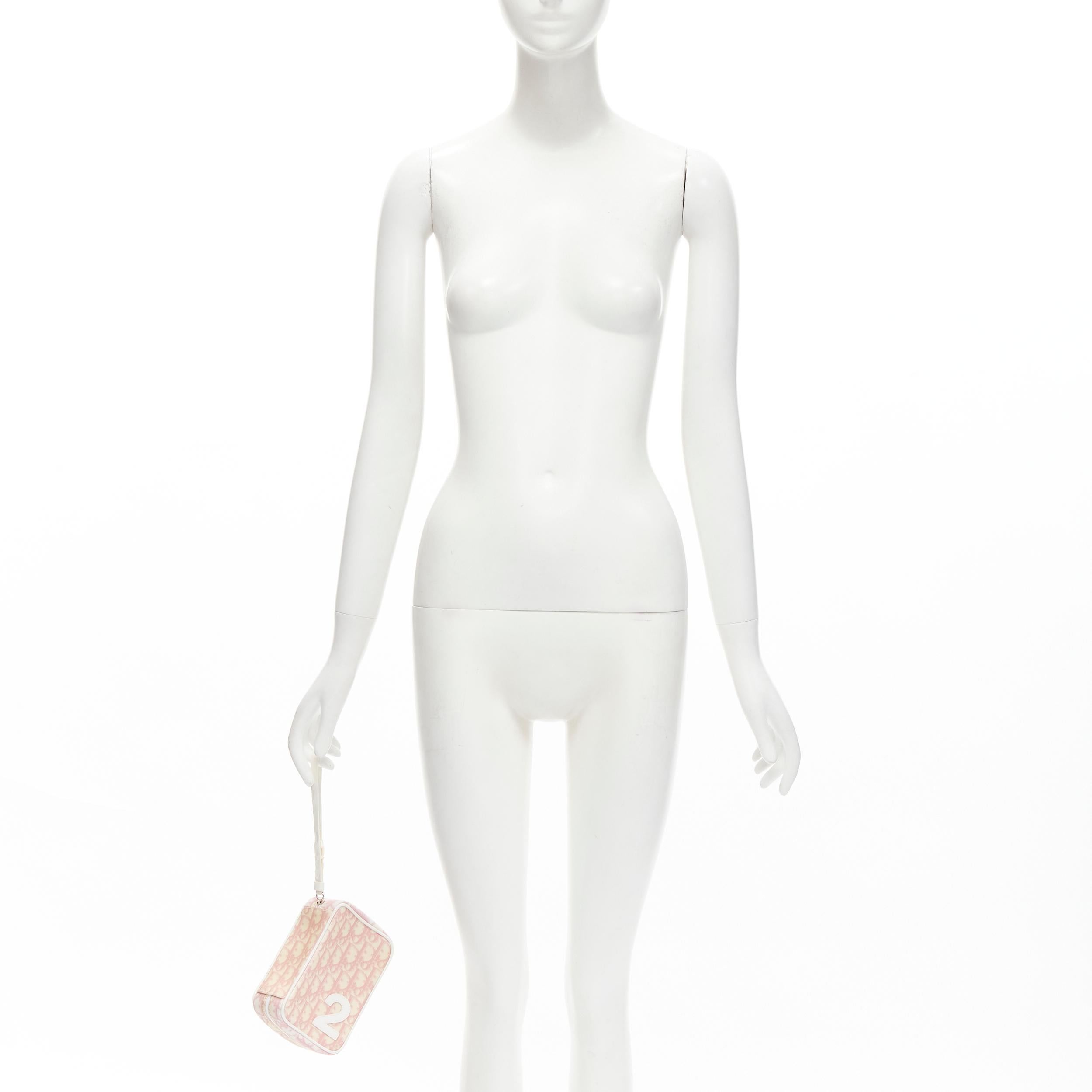 CHRISTIAN DIOR Parfums Y2K Vintage pink trotter monogram 1 wristlet bag
Reference: KELE/A00015
Brand: Christian Dior
Designer: John Galliano
Material: Canvas, Plastic
Color: Pink, White
Pattern: Monogram
Closure: Zip
Lining: Pink Fabric
Made in: