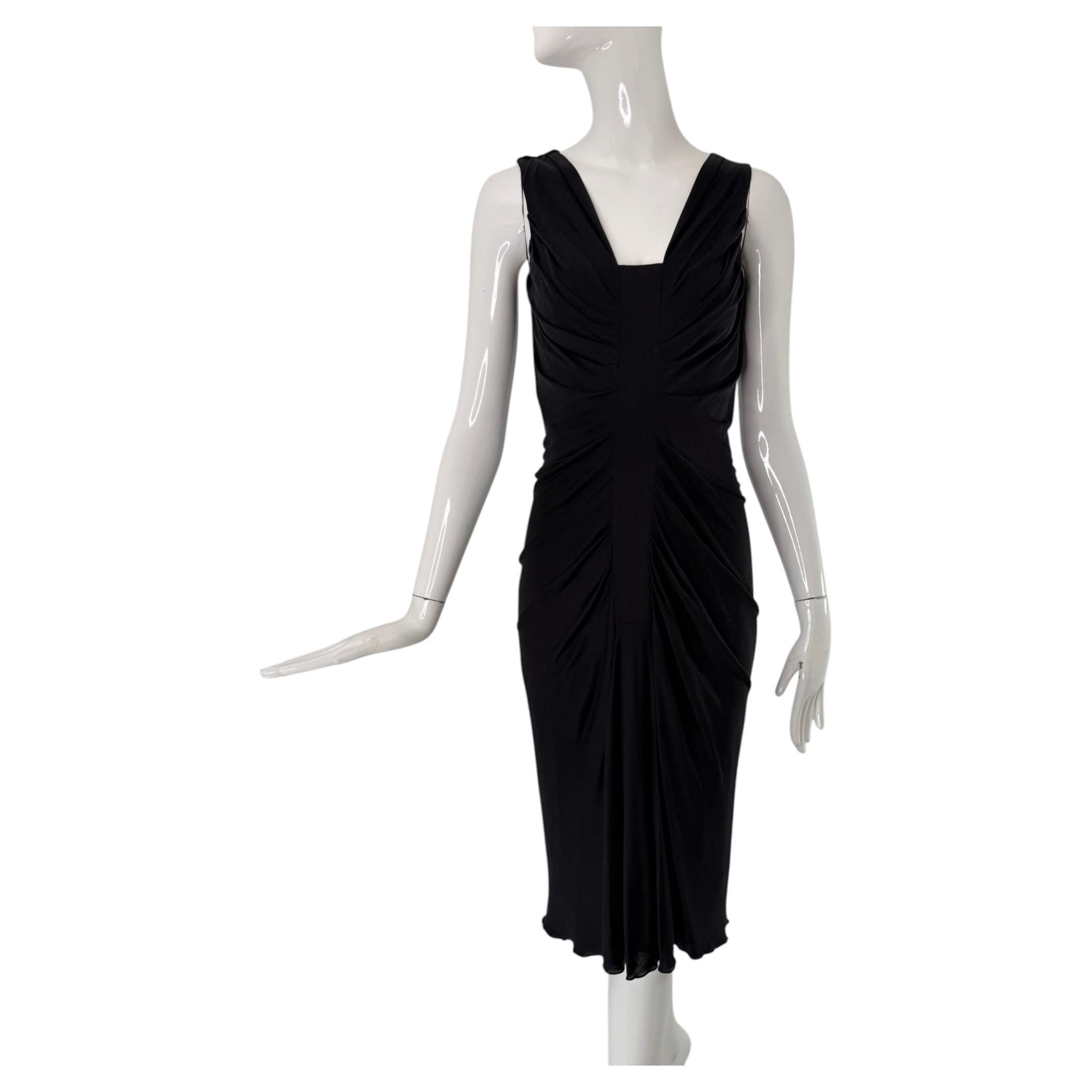 Robe de cocktail Christian Dior Paris en jersey de soie noir, avec découpe sur le devant, taille 6