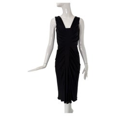 Robe de cocktail Christian Dior Paris en jersey de soie noir, avec découpe sur le devant, taille 6