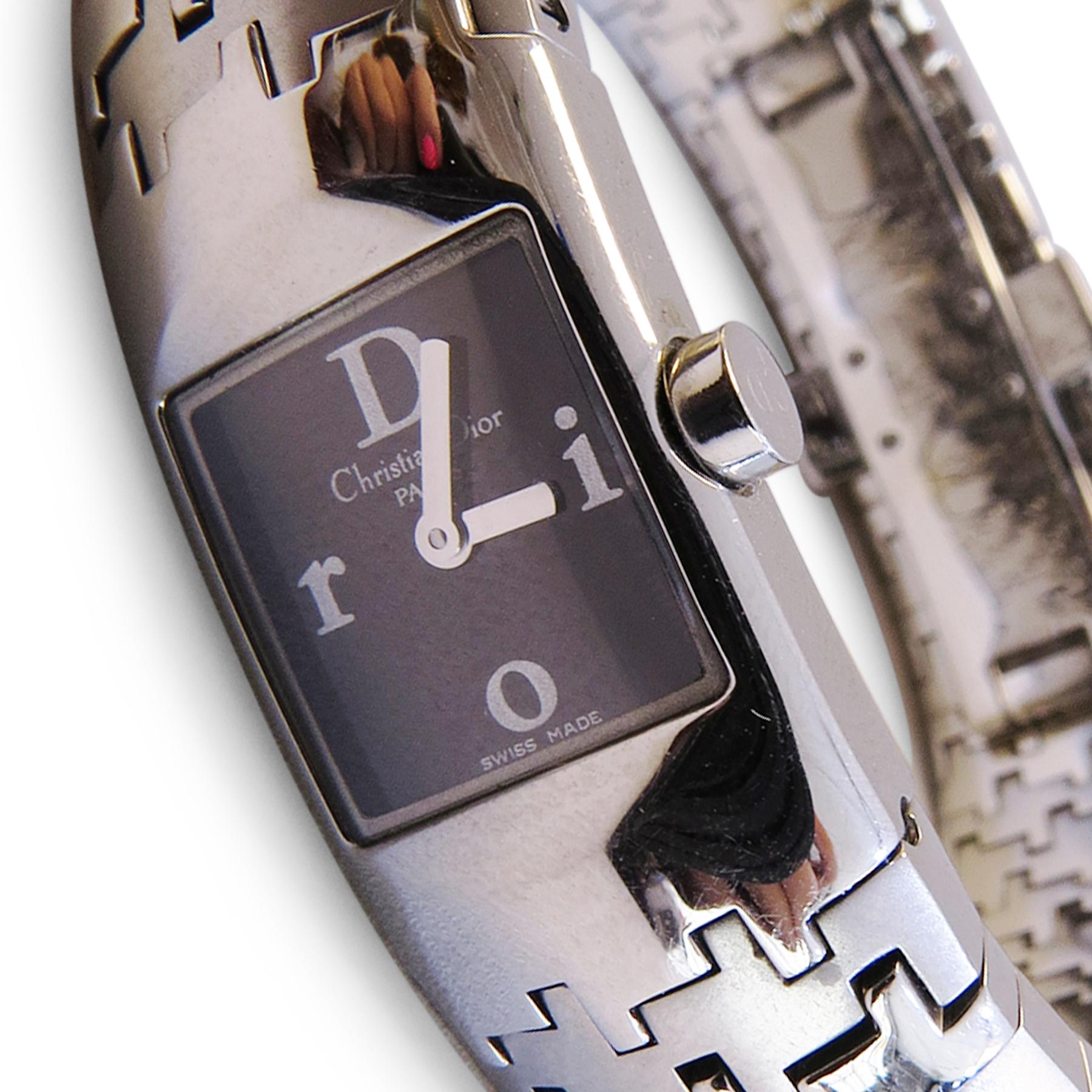 Christian Dior
Swiss 
St. Steel 
Band= 15mm
Thickness= 5mm   
Quartz Movement 