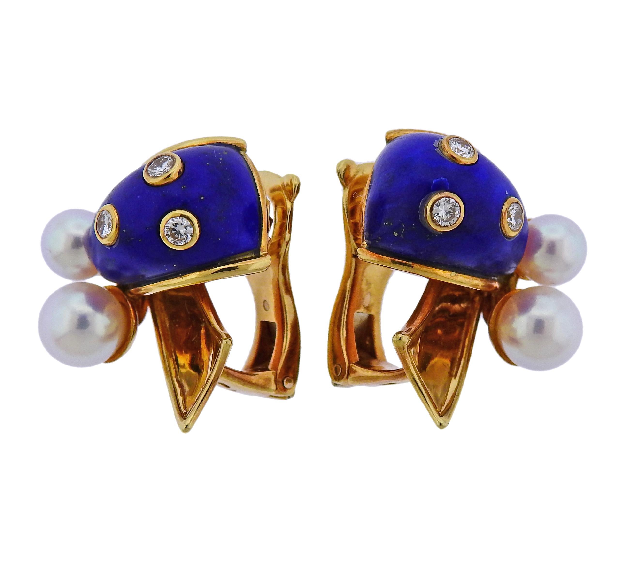 Pair of 18k yellow gold earrings by Christian Dior, set with 5.5mm and 6.5mm pearls, lapis and approx. 0.30ctw in G/VS diamonds. Earrings are 21mm x 20mm and weigh 17.9 grams. Marked Dior, or750, Gold marks.