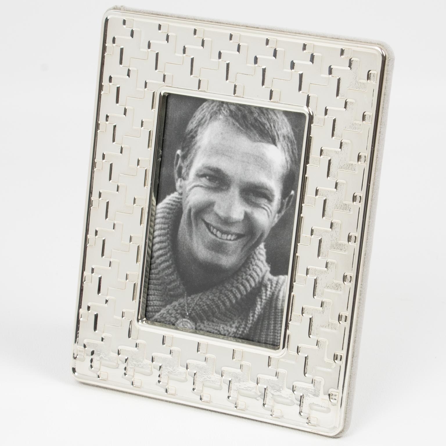 This charming Christian Dior Paris silver plate picture photo frame boasts a stylized geometric 
