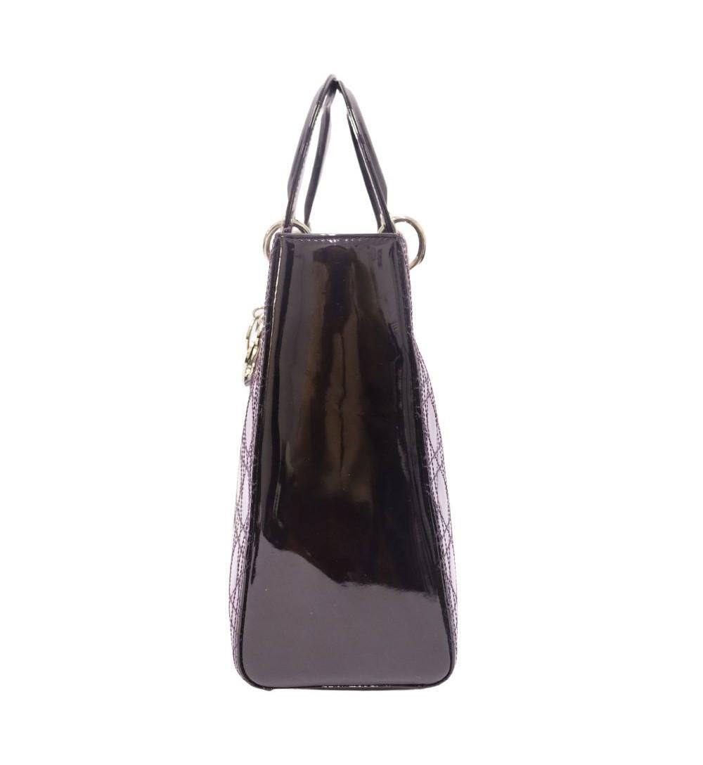 Christian Dior Dark Purple Patent Leather Cannage Large Lady Dior Satchel Bag, Features an adjustable and removable shoulder strap, Large attached compartment and one interior zipper pocket. 

Material: Leather 
Hardware: Silver
Height: 26cm
Width: