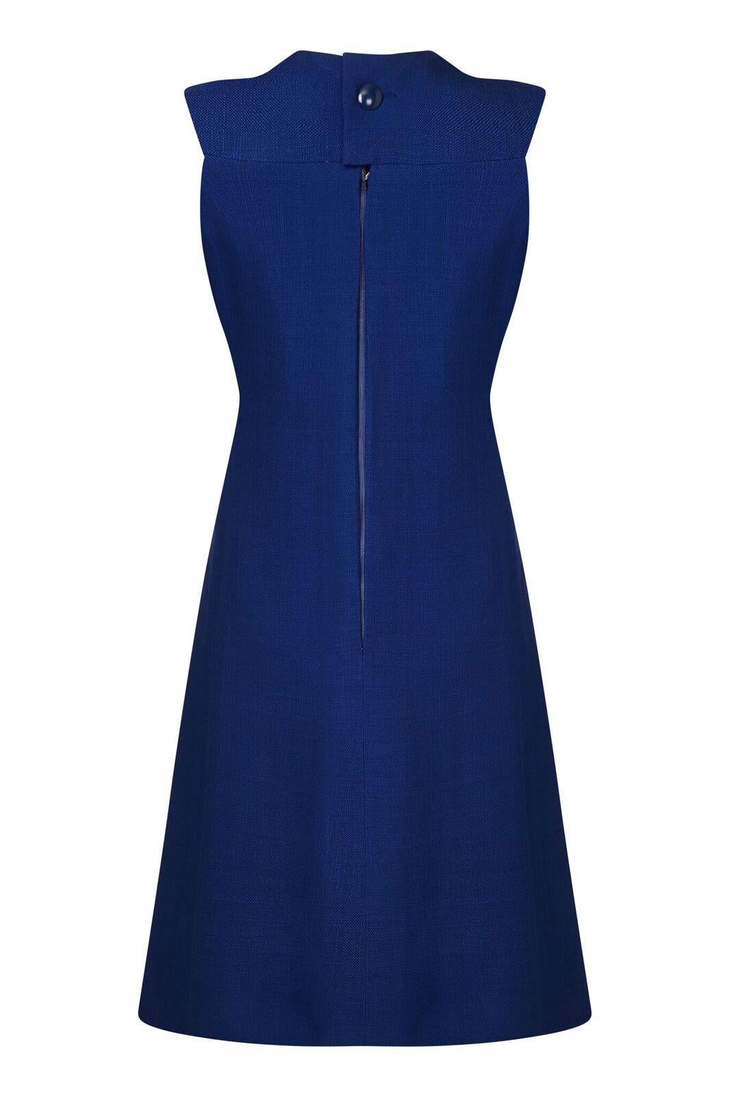 This stylish 1960s Demi Couture Patron Original labelled and numbered dress by Christian Dior is a magnificent piece of tailoring and is in impeccable condition. The high quality heavy linen fabric in French Blue has retained all of its vibrancy and