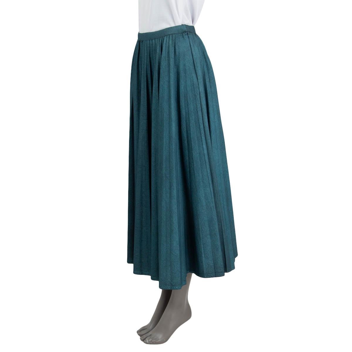 100% authentic Christian Dior 2021 pleated glitter denim midi skirt in petrol cotton (100%). Opens with a concealed zipper and a push button on the side. Unlined. Has been worn once and is in virtually new condition.

Measurements
Tag