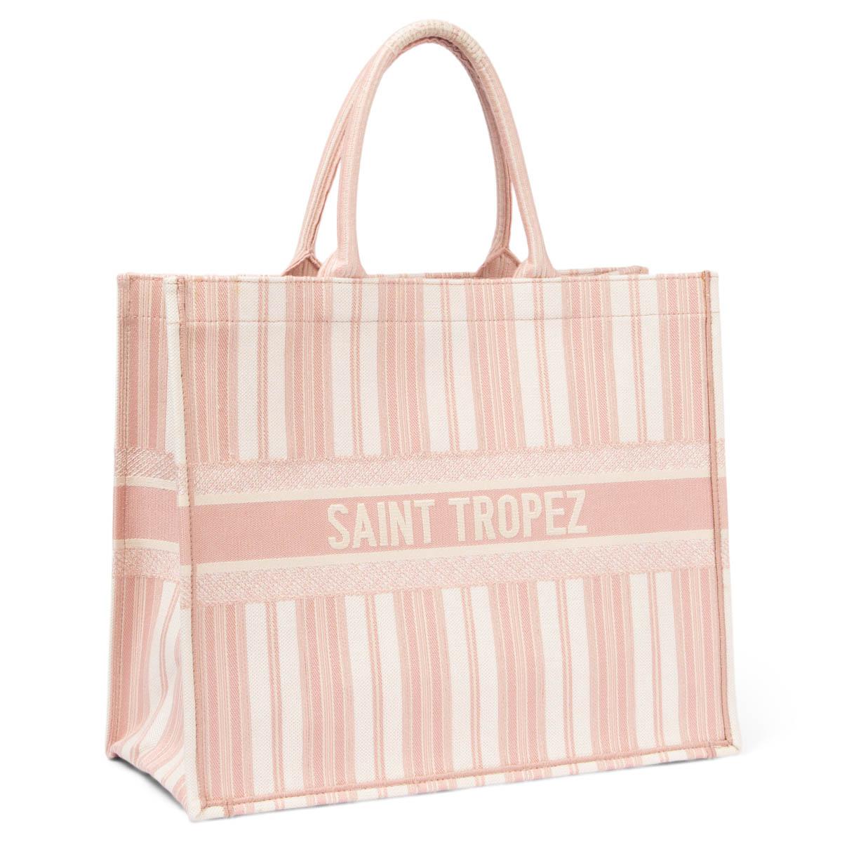 100% authentic Christian Dior 2019 Dioriviera Saint Tropez Large Book Tote in blush pink and off-white. Unlined. Brand new. 

Measurements
Height	35cm (13.7in)
Width	42cm (16.4in)
Depth	18cm (7in)
Drop of the Handle	17cm