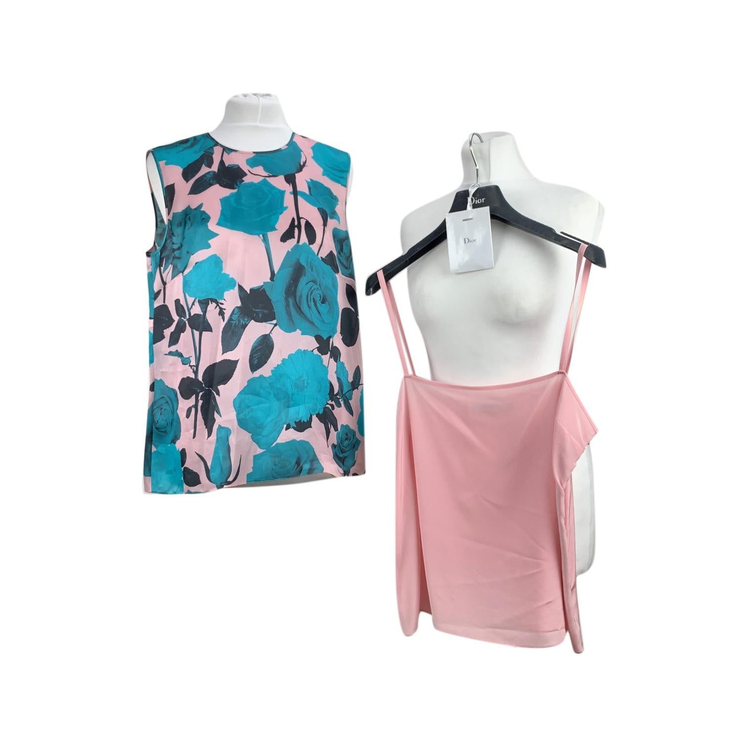 Beautiful Christian Dior pink and teal flotal shell top with camitop underlay. Composition: 100% Silk. Side zip closure. Round neckline Size:40 FR,, 12 GB, 44 IT, 38 D, 8 USA (The size shown for this item is the size indicated by the designer on the