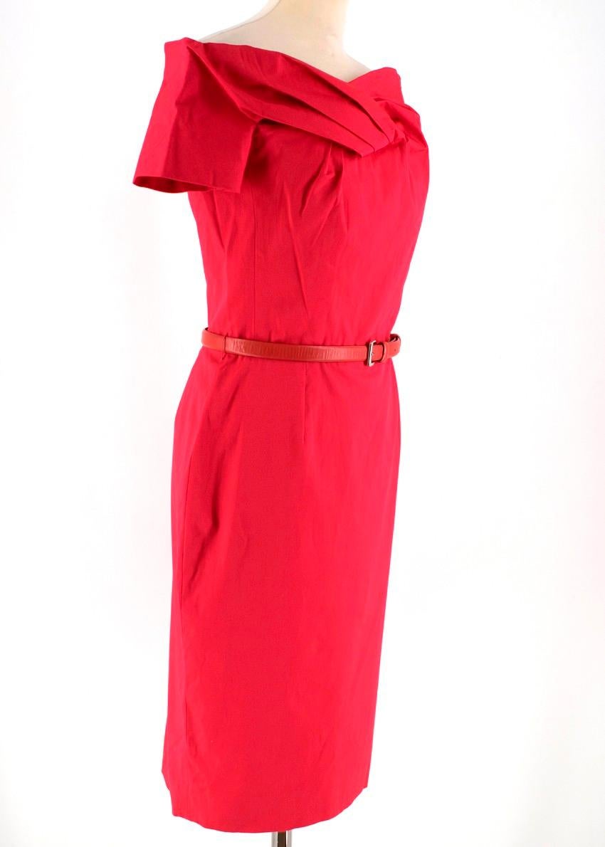 This cocktail dress was designed from pink cotton blend and a silk blend lining. With a lovely belt on the empire line waist, it features a boat neck, an invisible back zip fastening, short sleeves and a straight fit.

Please note, these items are