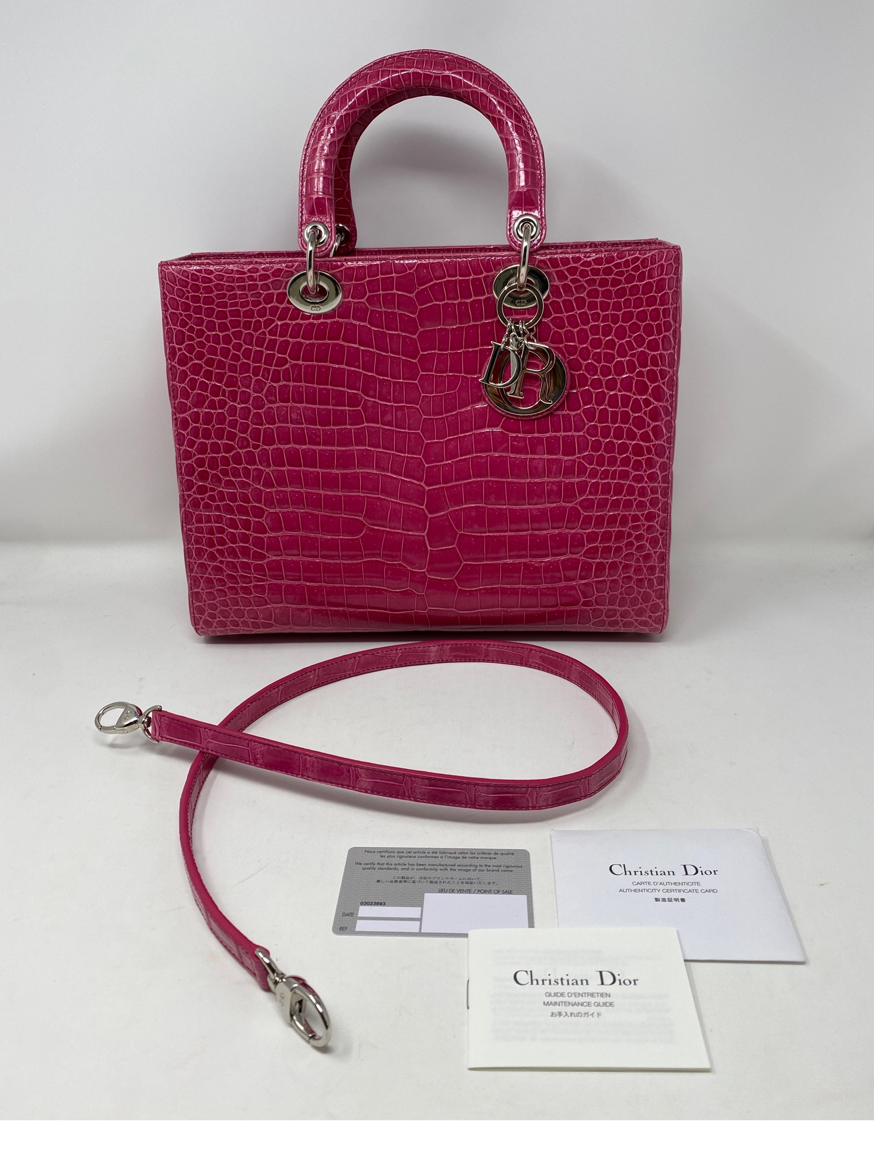 Christian Dior Lady Pink Crocodile Bag. Absolutely stunning Lady Dior bag. Mint like new condition. Beautiful hot pink color exotic crocodile. Silver hardware. Large size Lady bag with removable crocodile strap. Don't miss out on this amazing