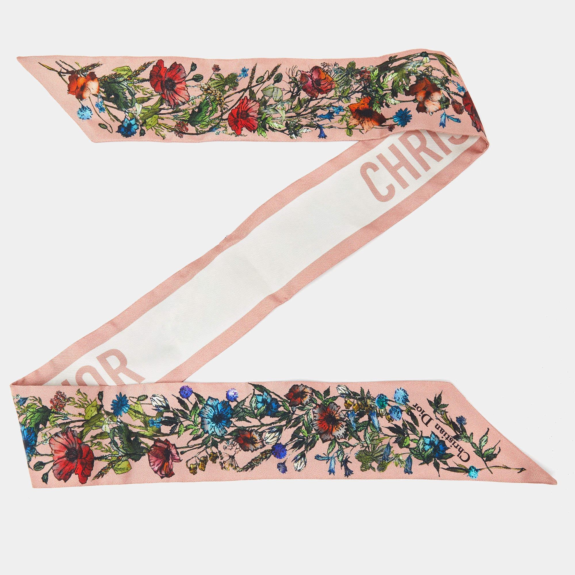 This Dior twilly is a luxurious fashion accessory. Made from high-quality silk, it features vibrant hues. It adds a touch of elegance when tied around the neck or wrist, enhancing any outfit with its timeless craftsmanship.

Includes: Original Box