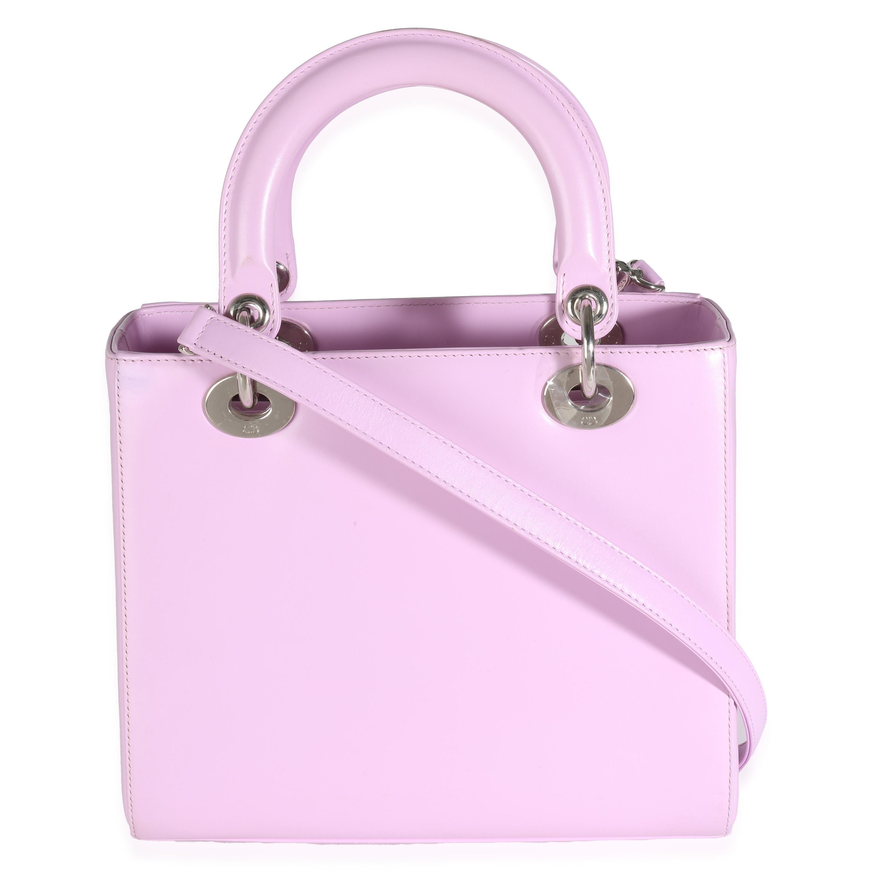 Listing Title: Christian Dior Pink Lambskin Pockets Medium Lady Dior
SKU: 142675
Condition: Pre-owned 
Condition Description: Originally named the 'Chouchou', the Lady Dior bag from Dior was renamed after Princess Diana carried the bag at the Grand