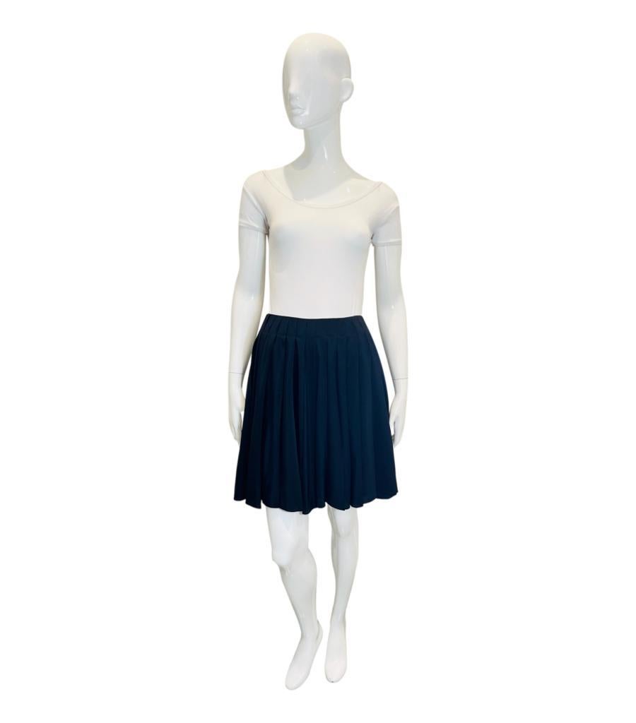 Christian Dior Pleated Silk Skirt

Classy skirt crafted in black silk and detailed with flared cut enhanced by pleats.

Featuring mini length, high-waist and concealed zip closure to the side.

Size – 38FR

Condition – Very Good

Composition – 100%