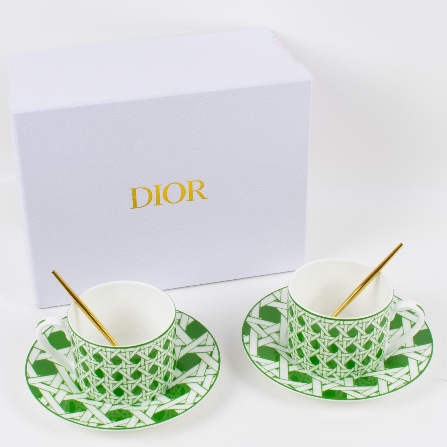 So lovely tea/coffee for two set by Christian Dior Home Collection. In its original branded gift box, the fine porcelain set features six pieces: 2 cups, 2 saucers, and 2 gilt metal teaspoons. Hand-painted iconic cane-work design that Christian Dior